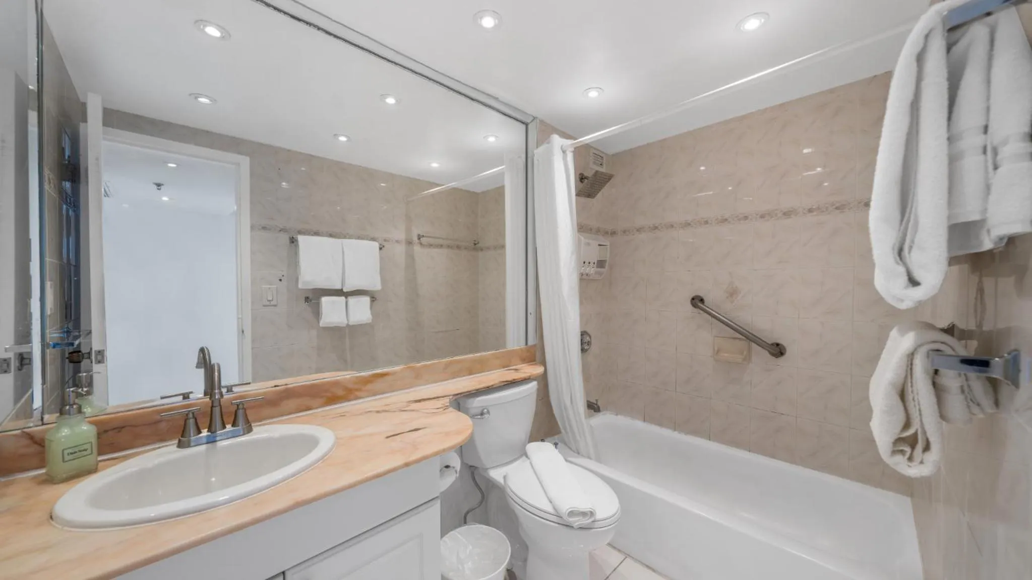 Shower in SeaStays Apartments