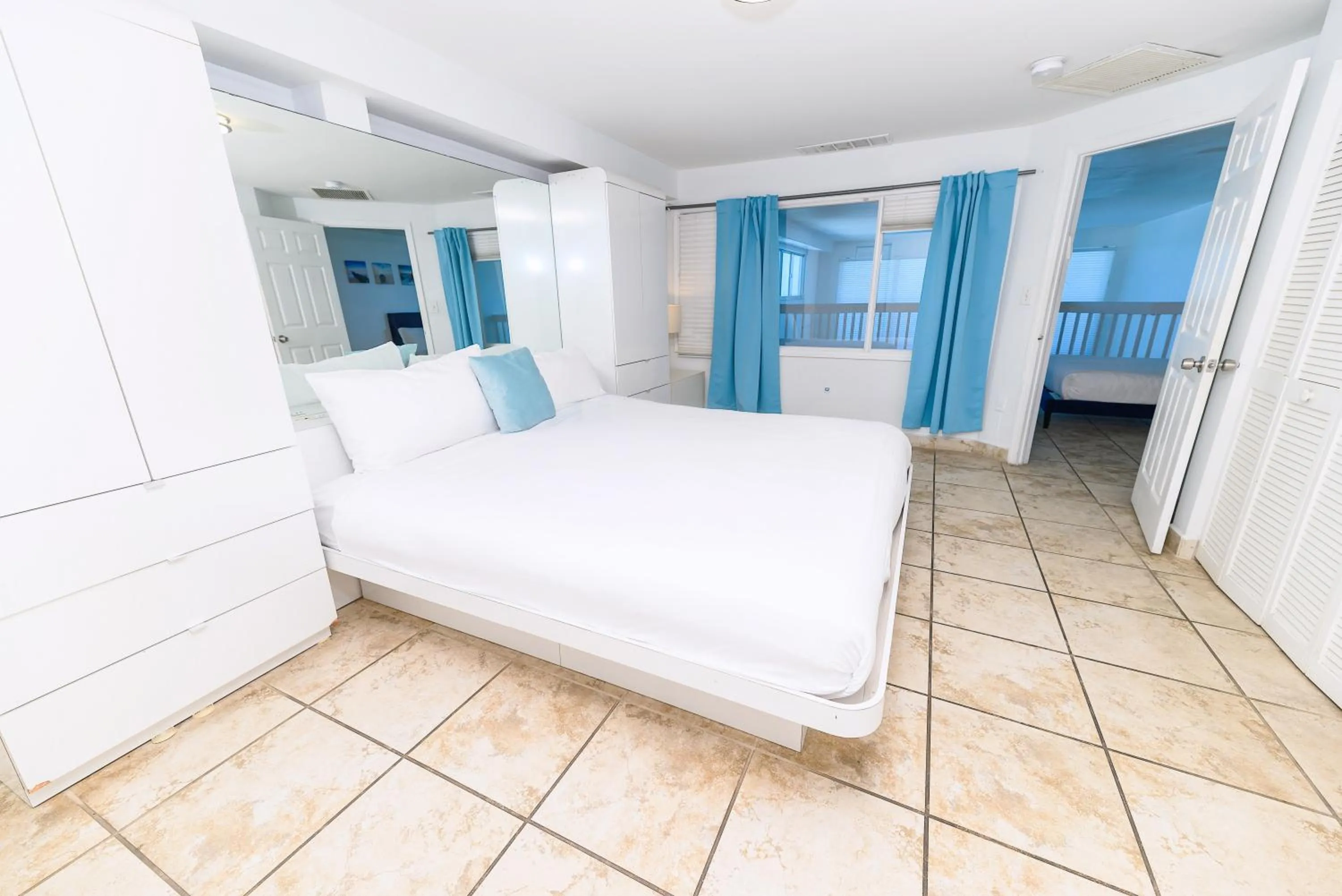 Bed in SeaStays Apartments