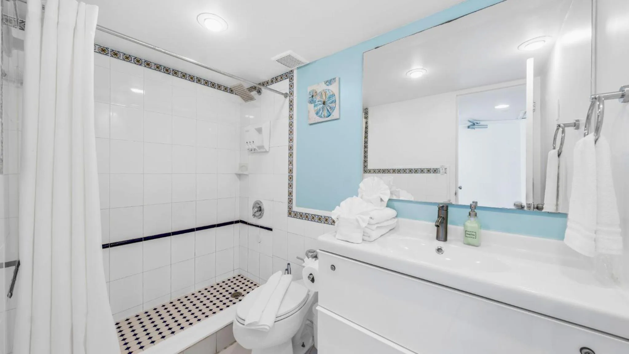 Shower in SeaStays Apartments