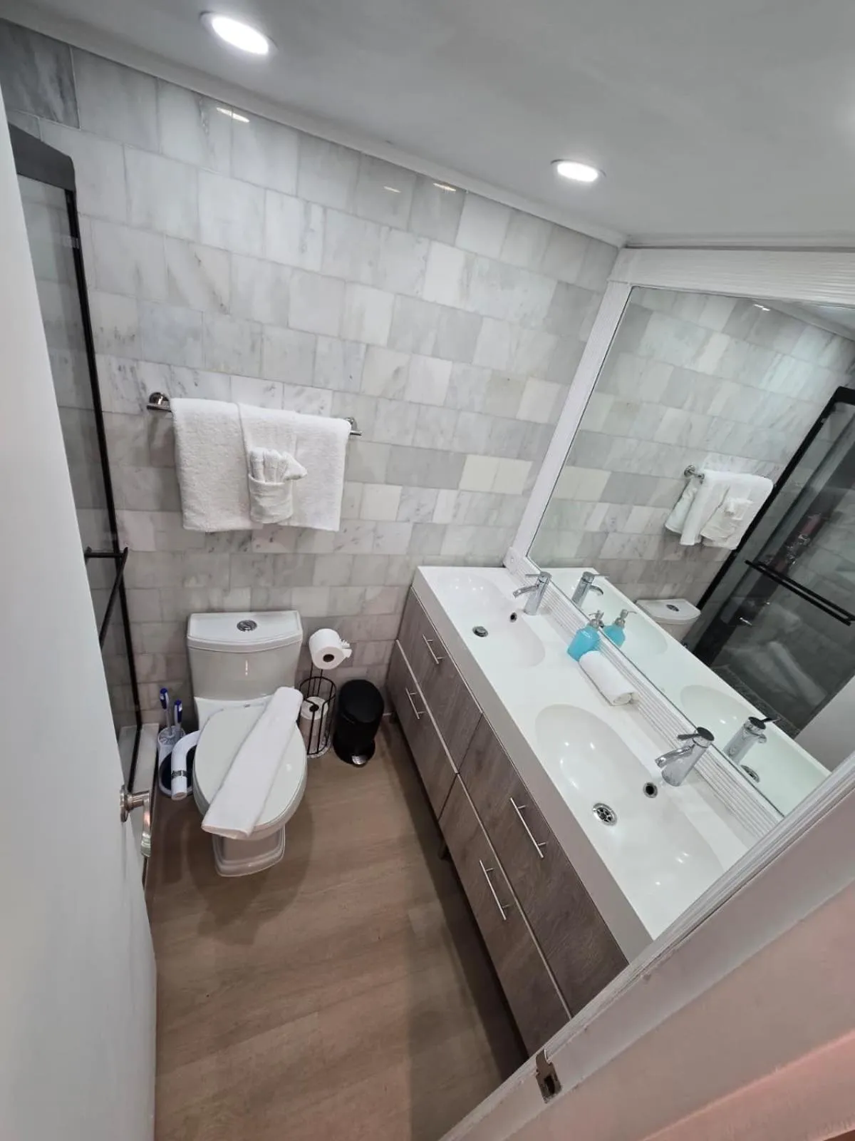 Shower in SeaStays Apartments