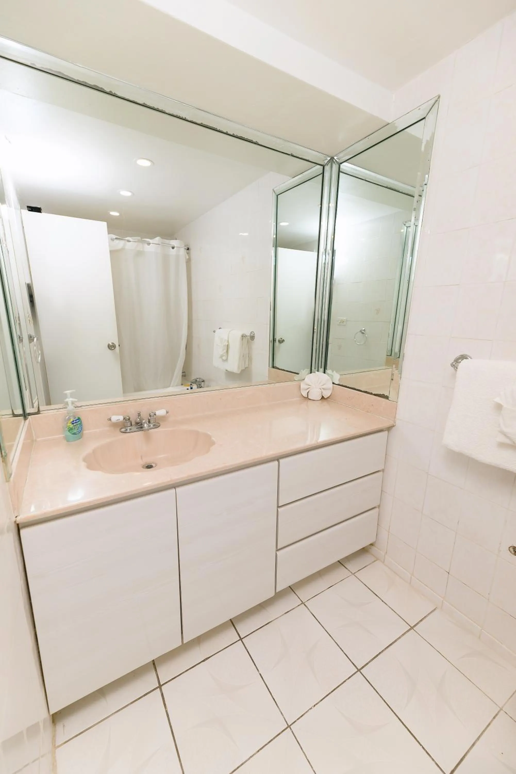 Shower in SeaStays Apartments