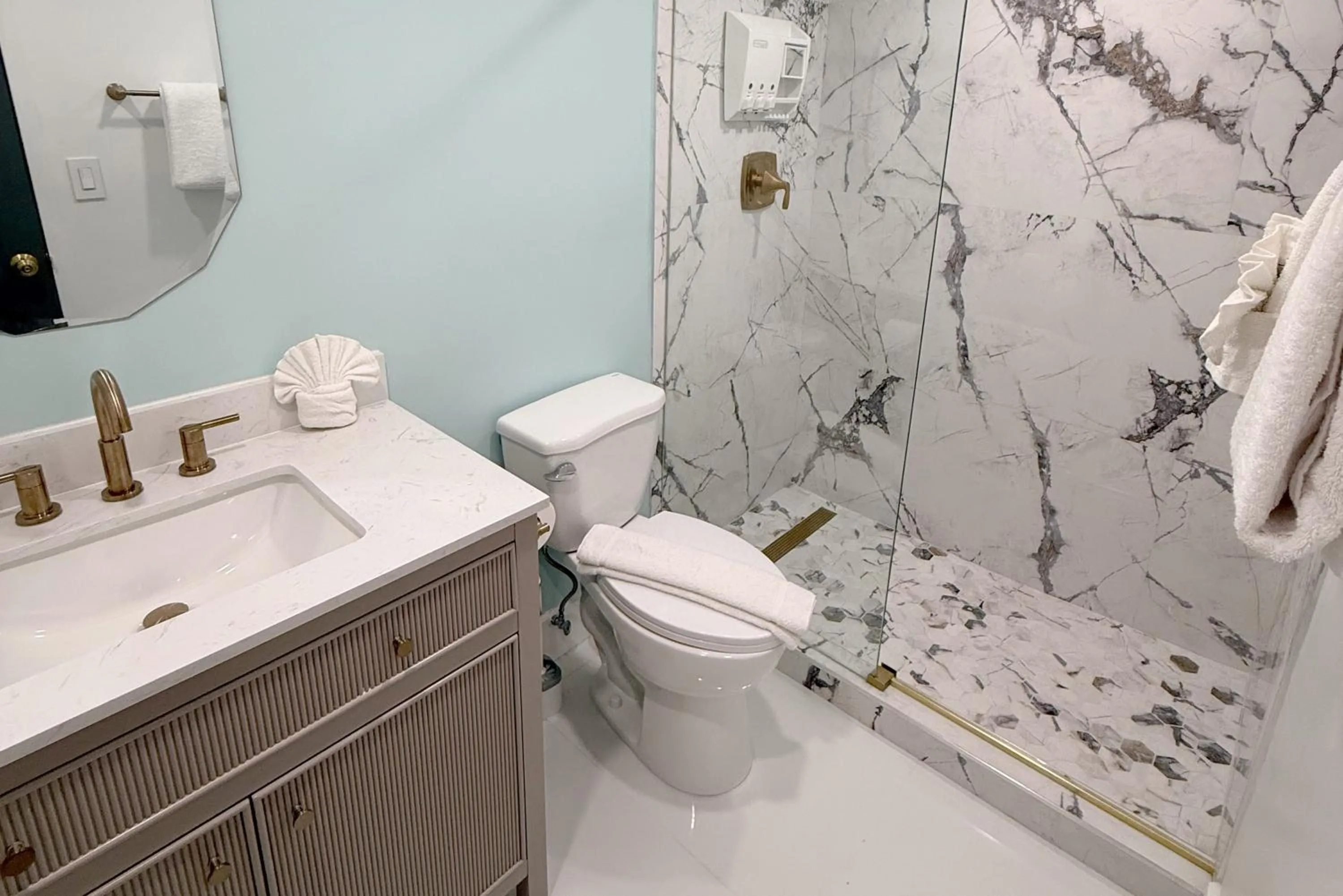 Shower in SeaStays Apartments