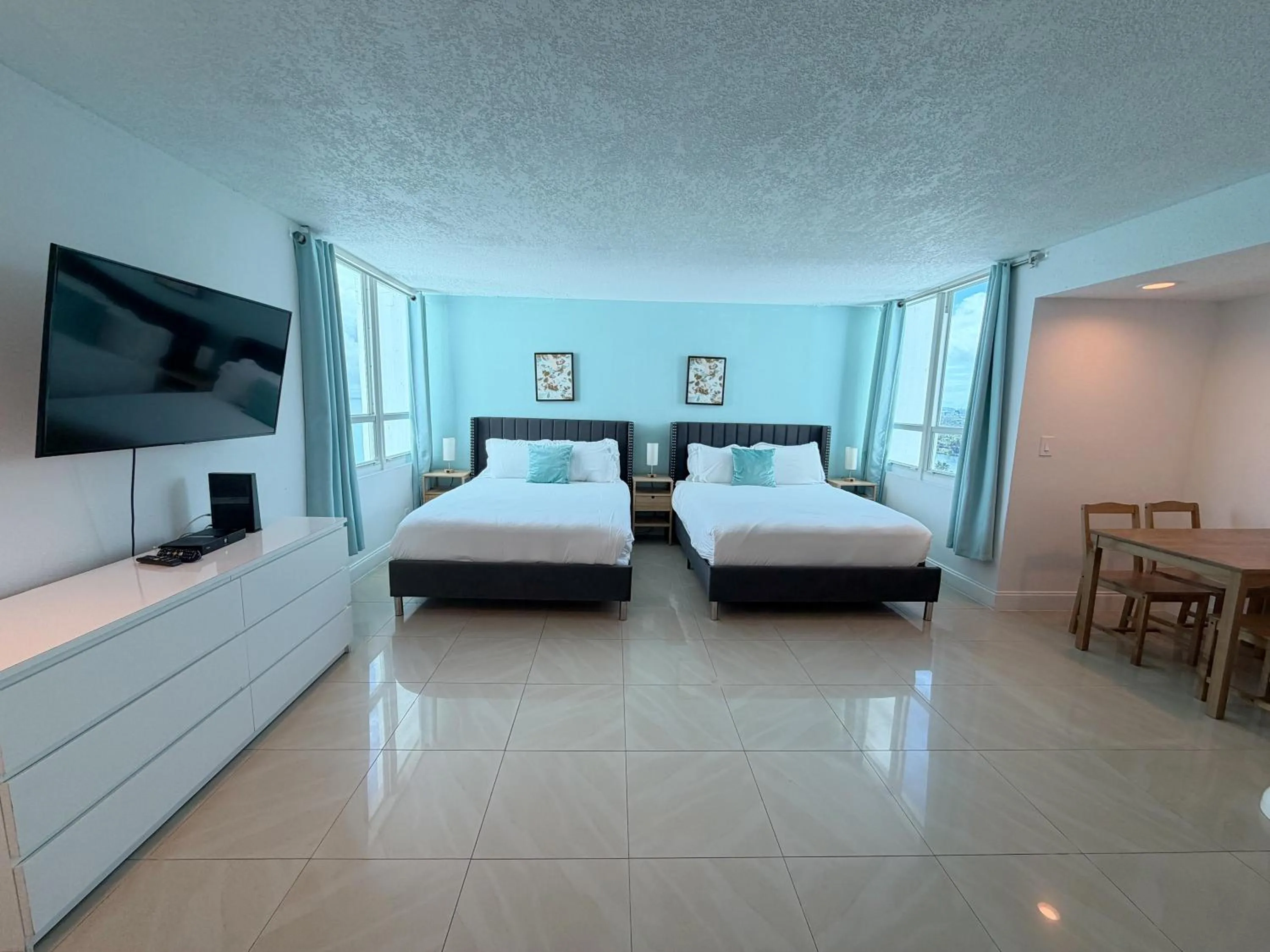 Bed in SeaStays Apartments