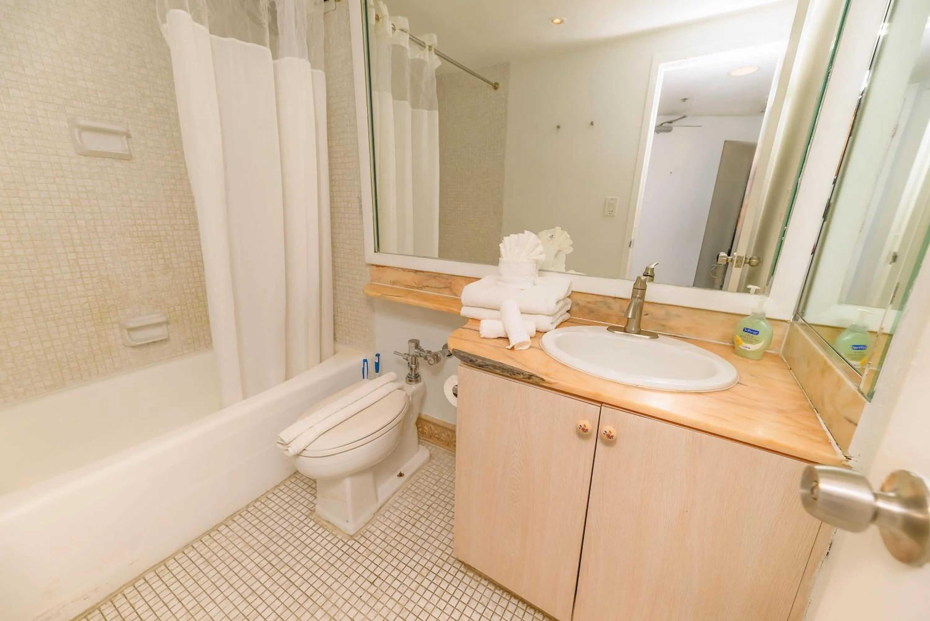 Shower in SeaStays Apartments