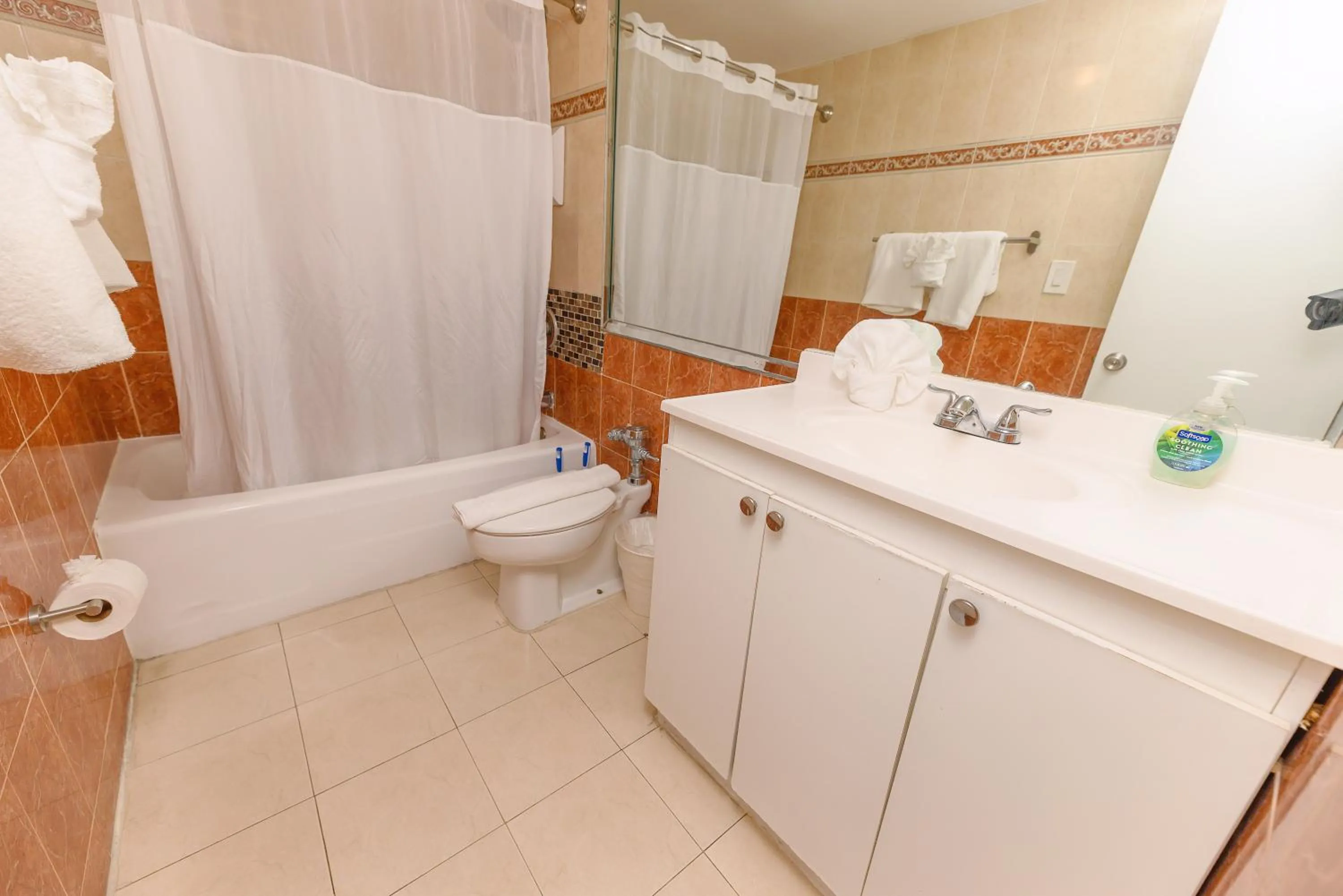 Shower in SeaStays Apartments