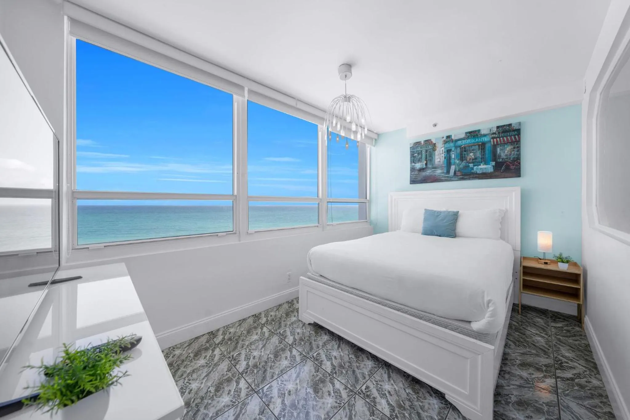 Bed in SeaStays Apartments