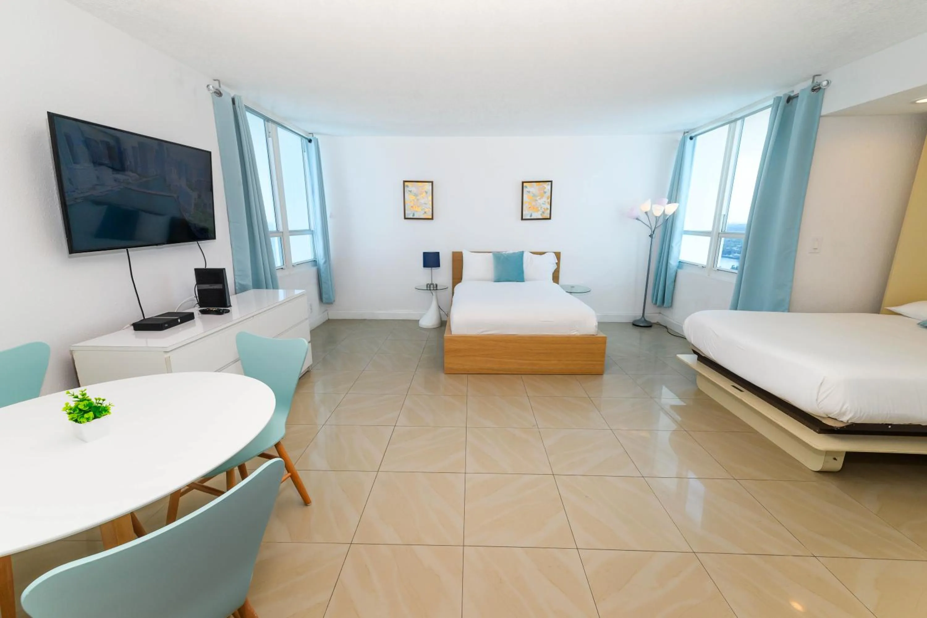 Bed in SeaStays Apartments