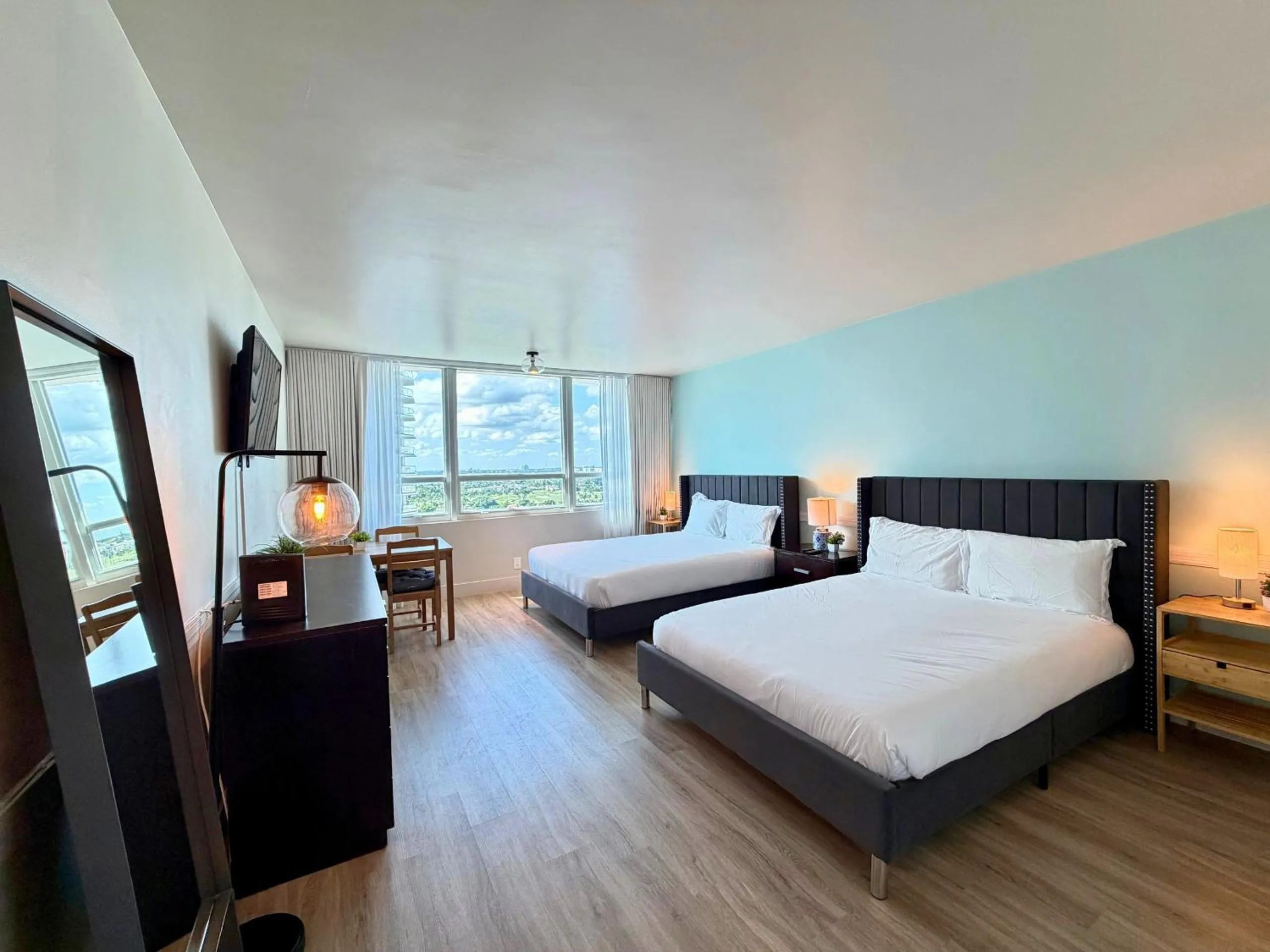 Bed in SeaStays Apartments