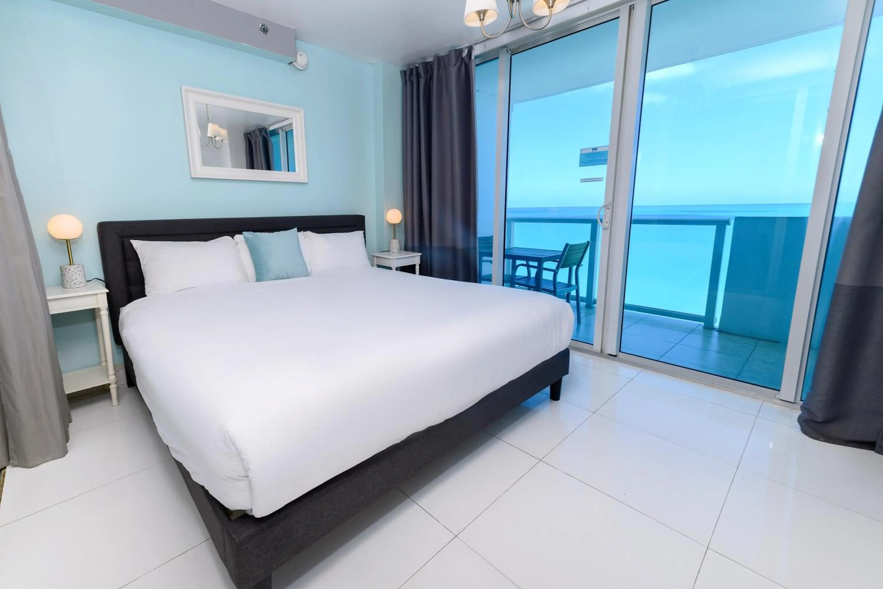 Bed in SeaStays Apartments