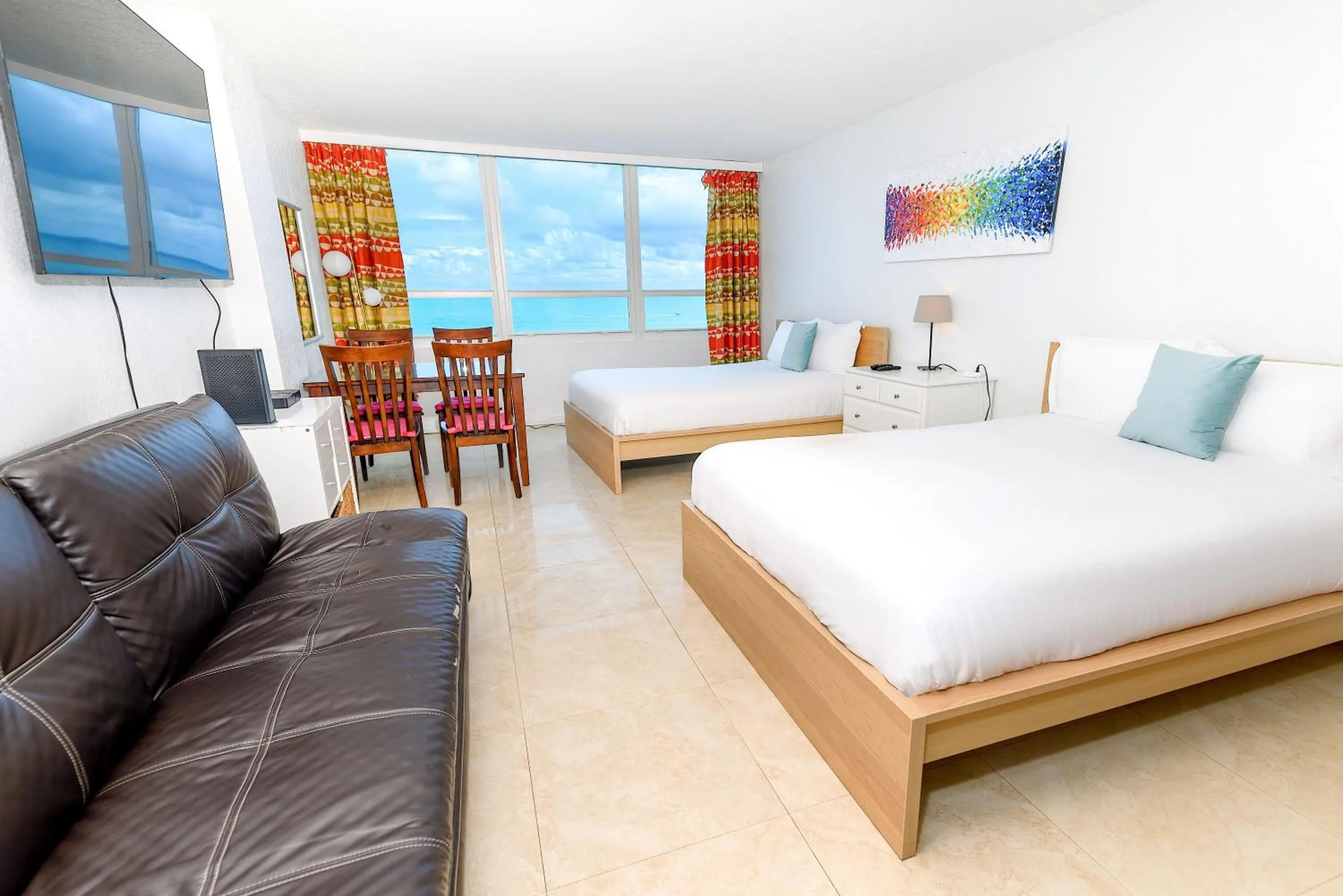 Bed in SeaStays Apartments