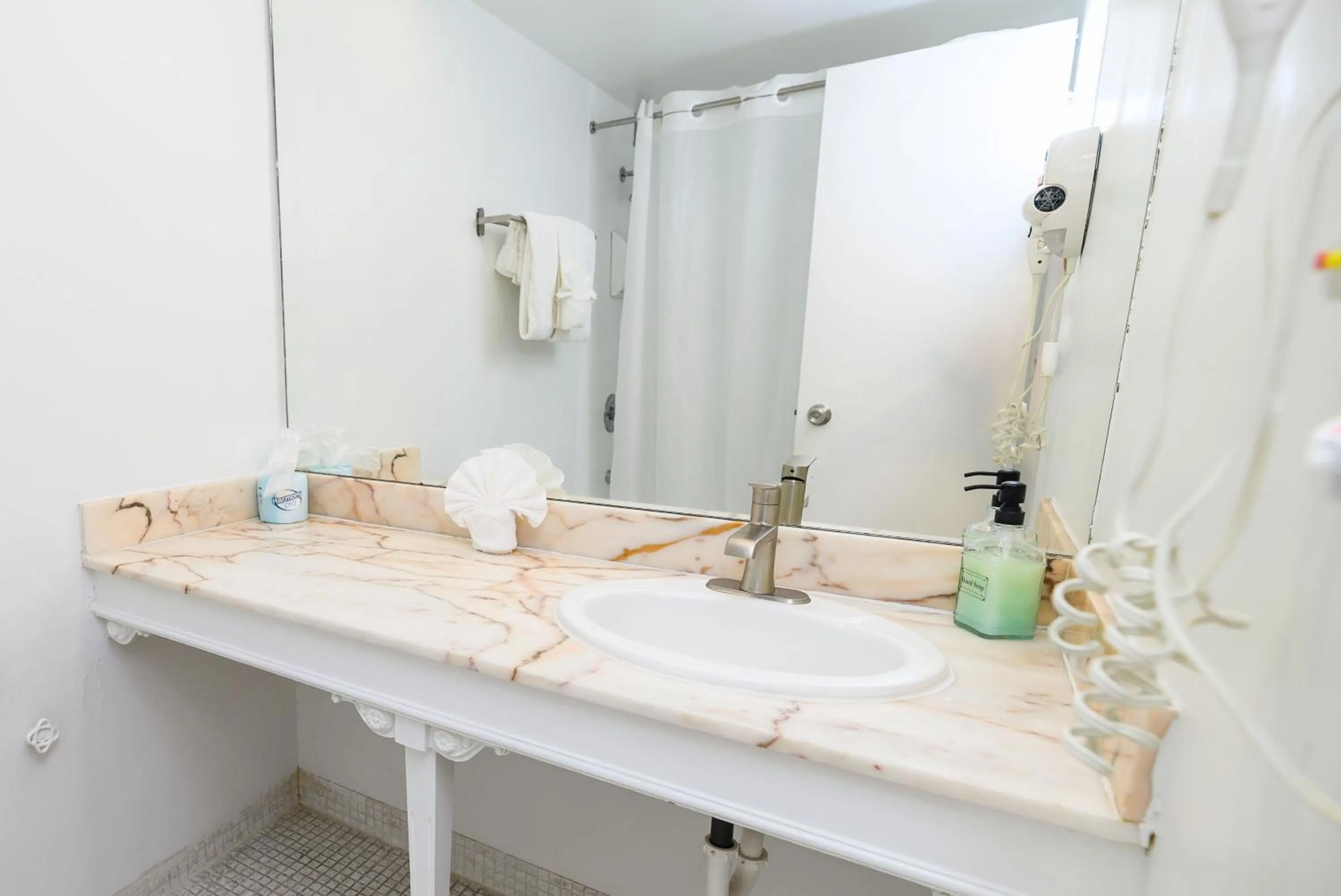 Shower in SeaStays Apartments