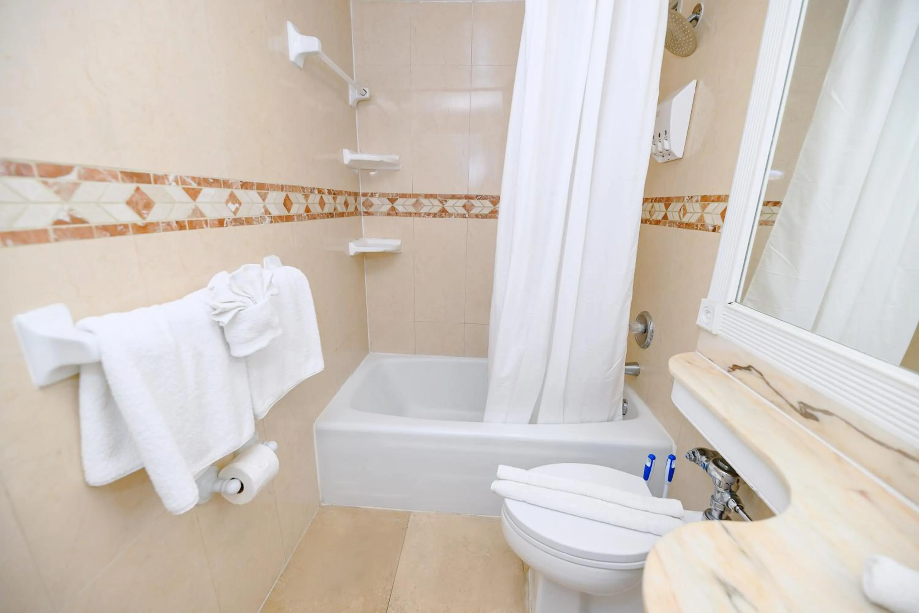 Shower in SeaStays Apartments