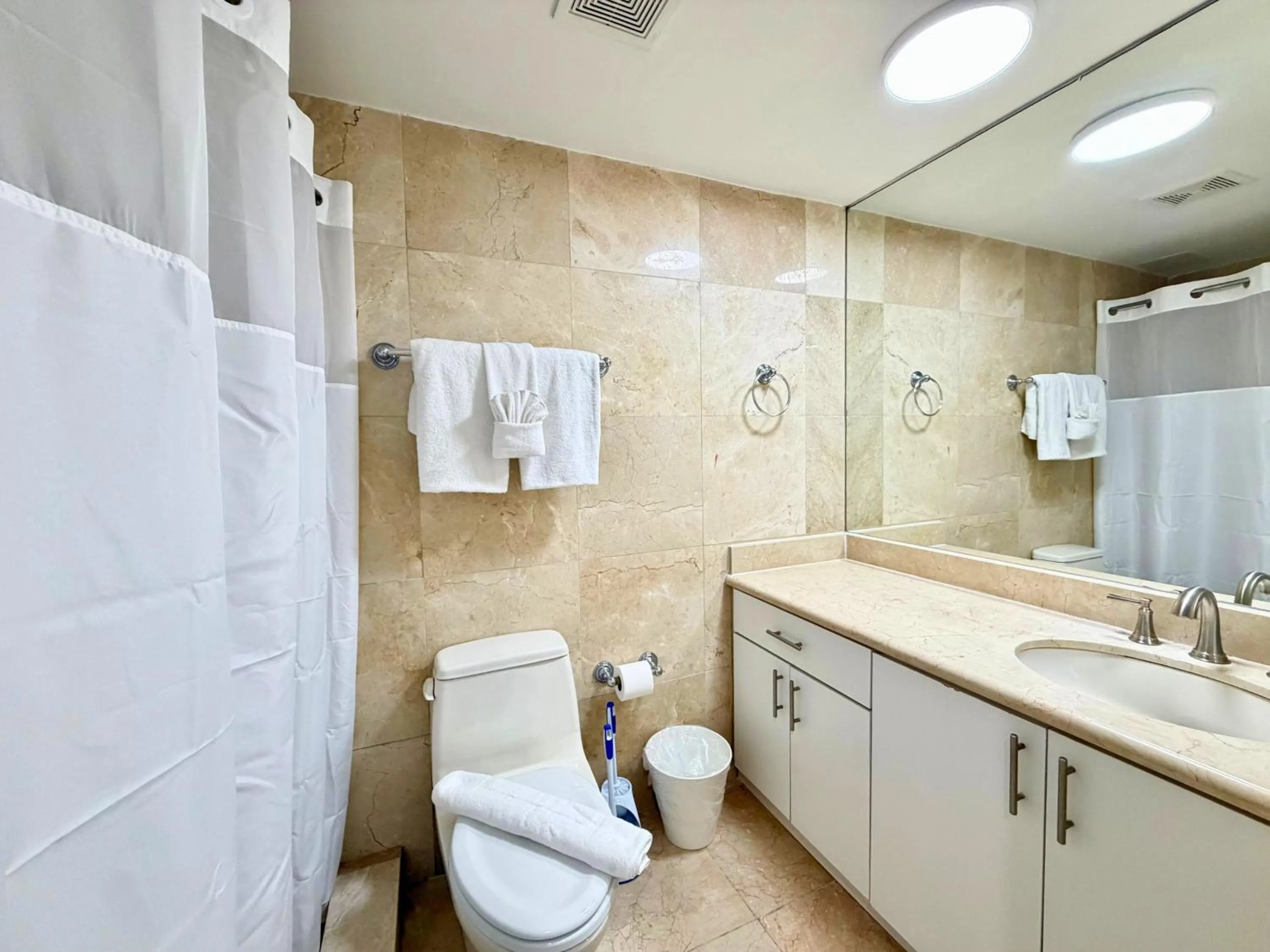 Shower in SeaStays Apartments