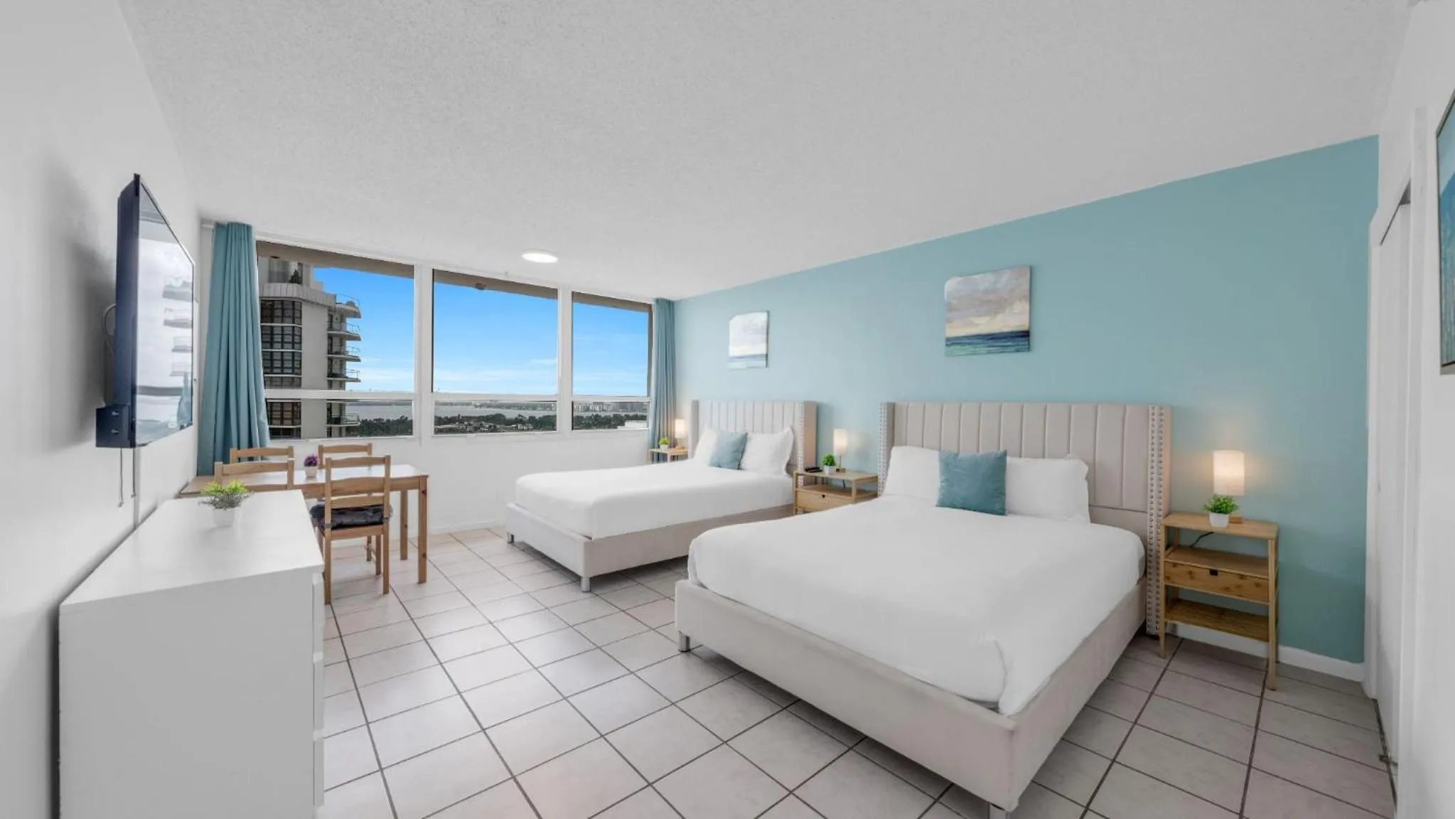 Bed in SeaStays Apartments