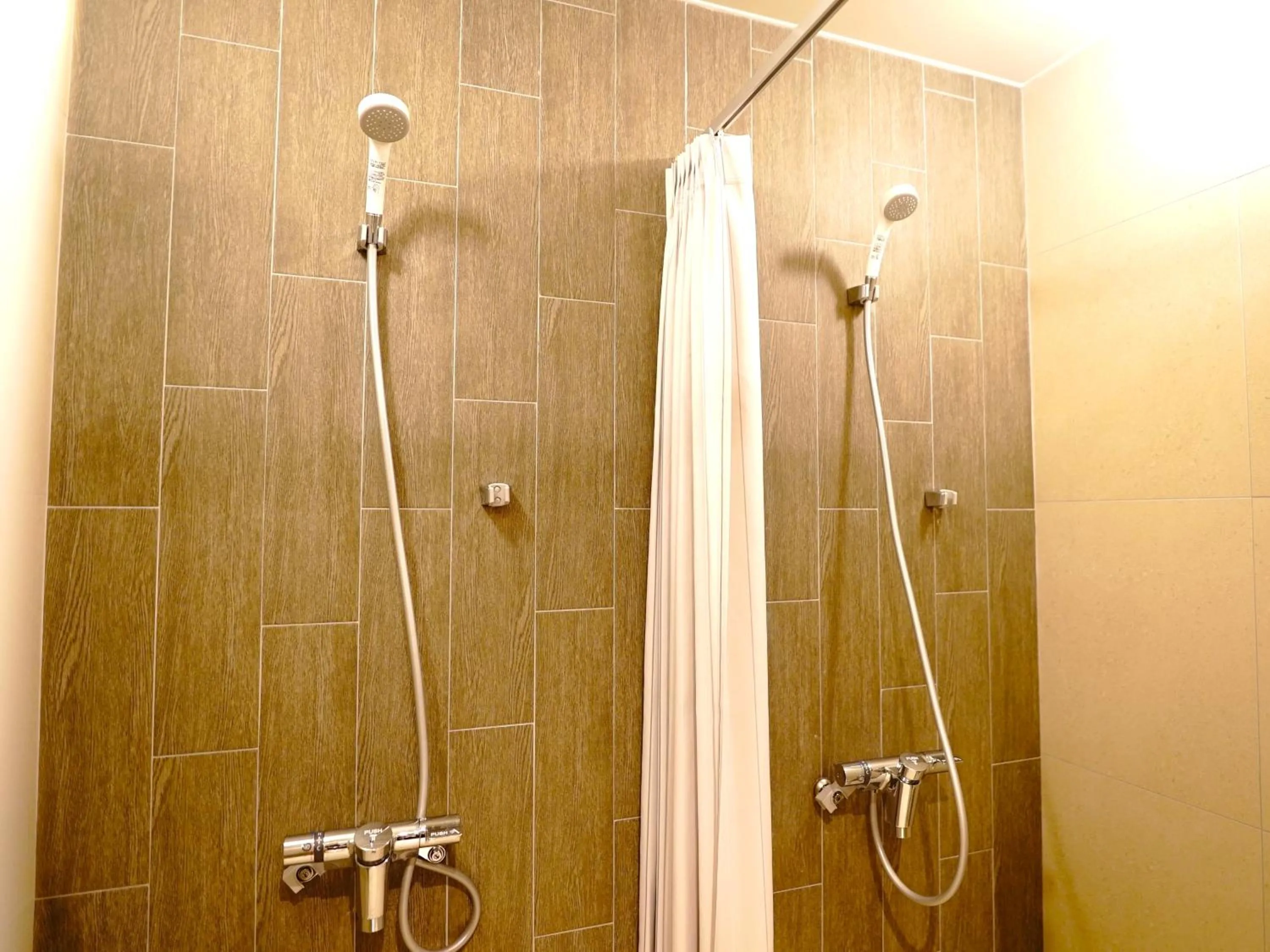 Shower in HOTEL SEABREEZE CORAL