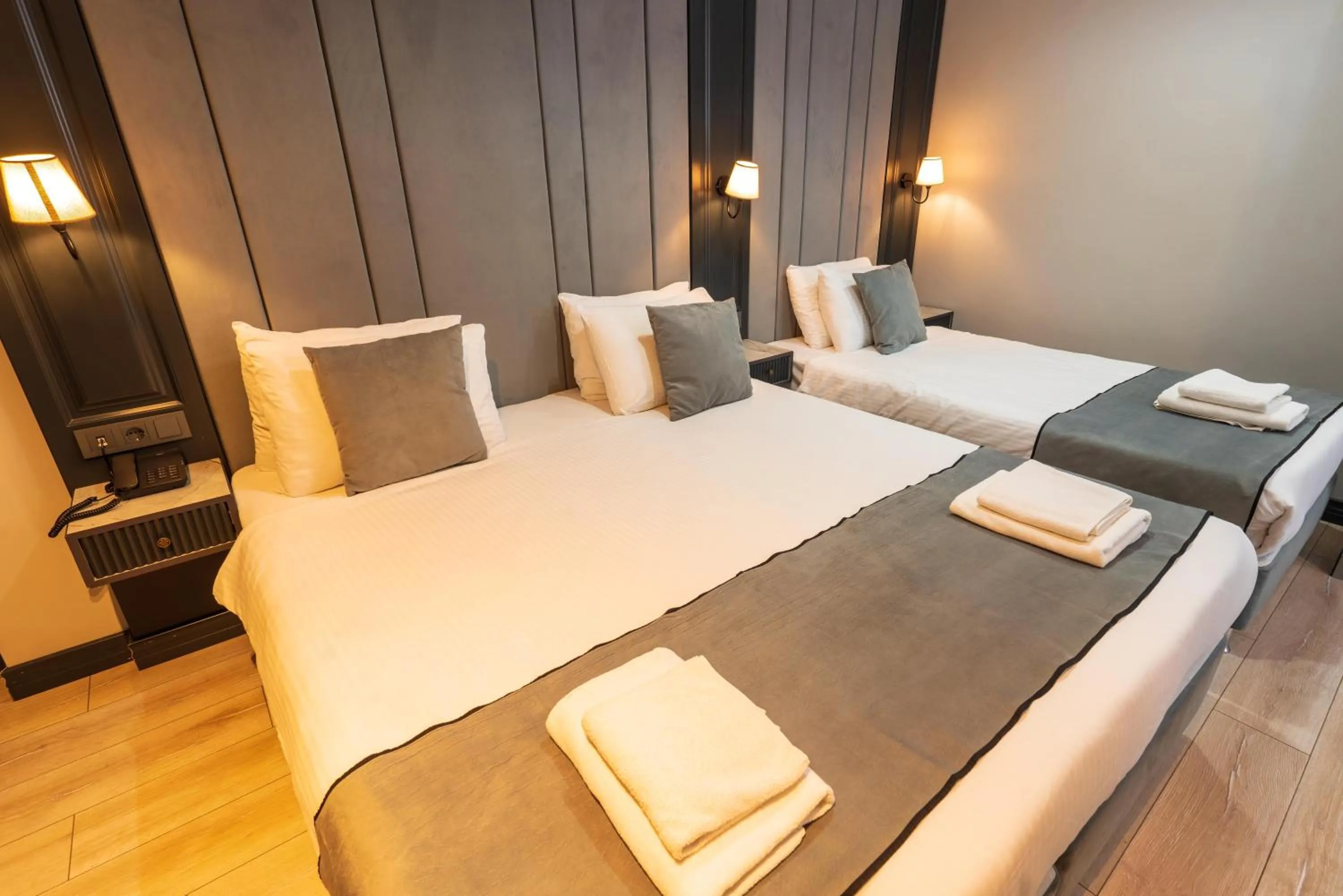 Bed in Express Plus Hotel