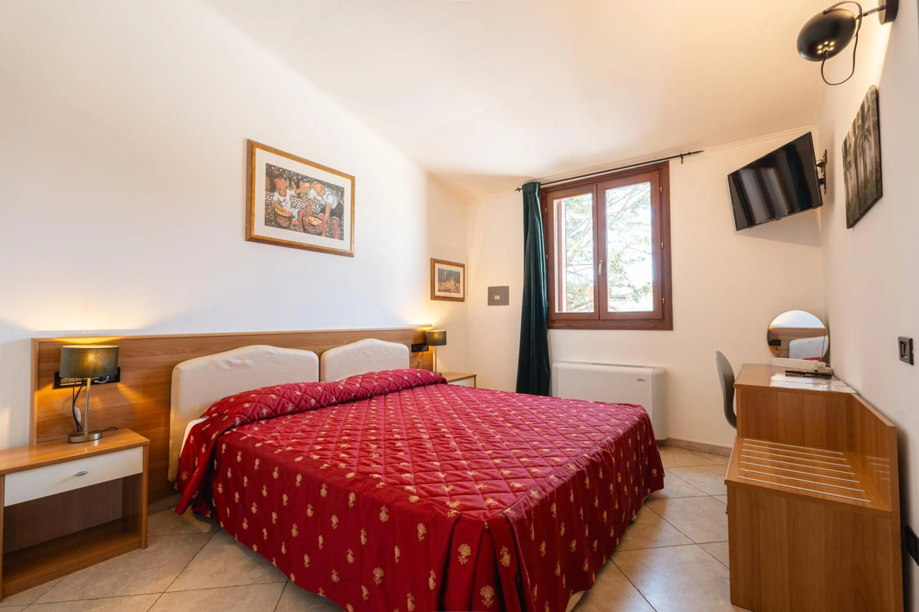 Bed in Hotel Le Corti