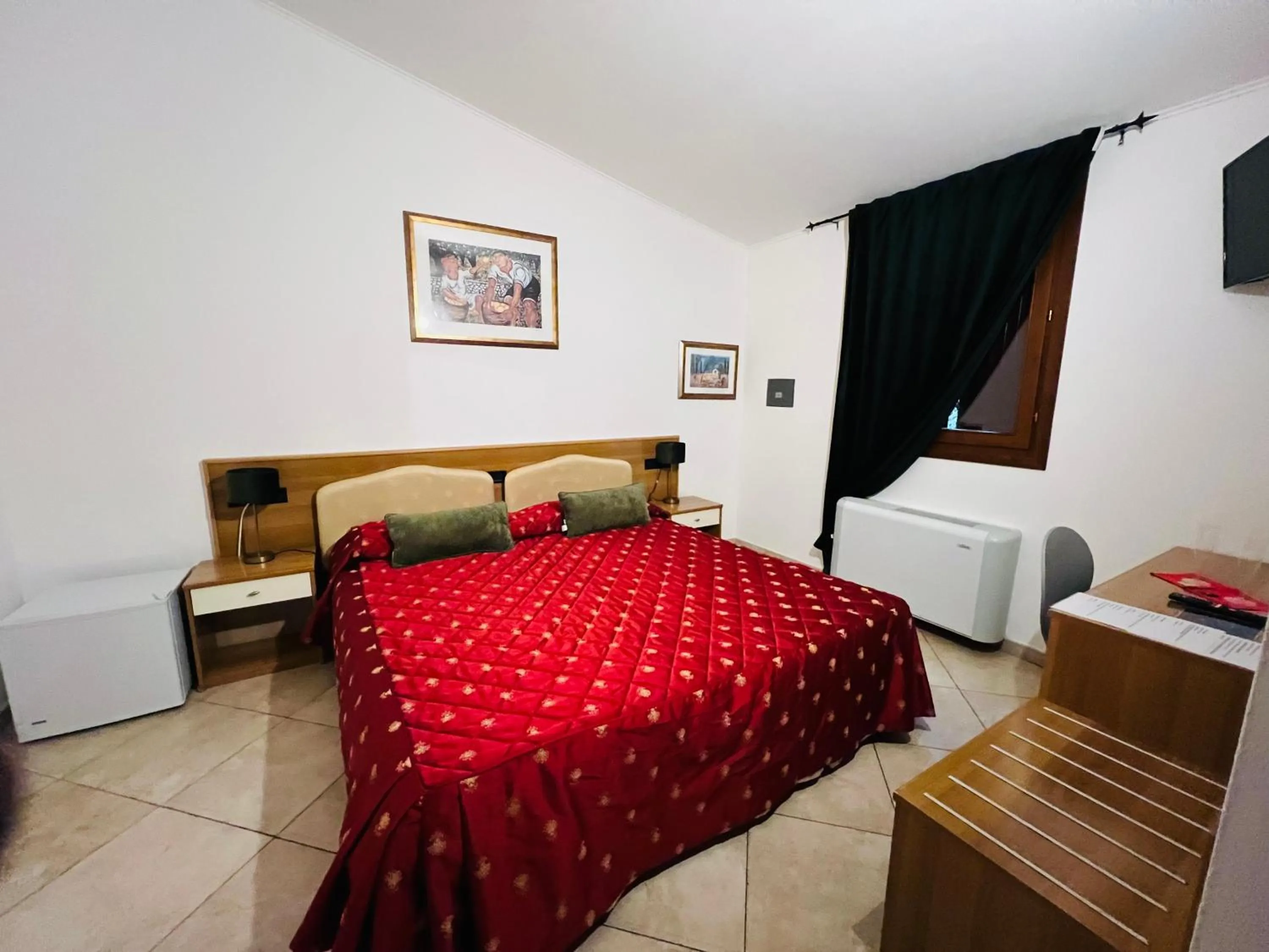 Bed in Hotel Le Corti