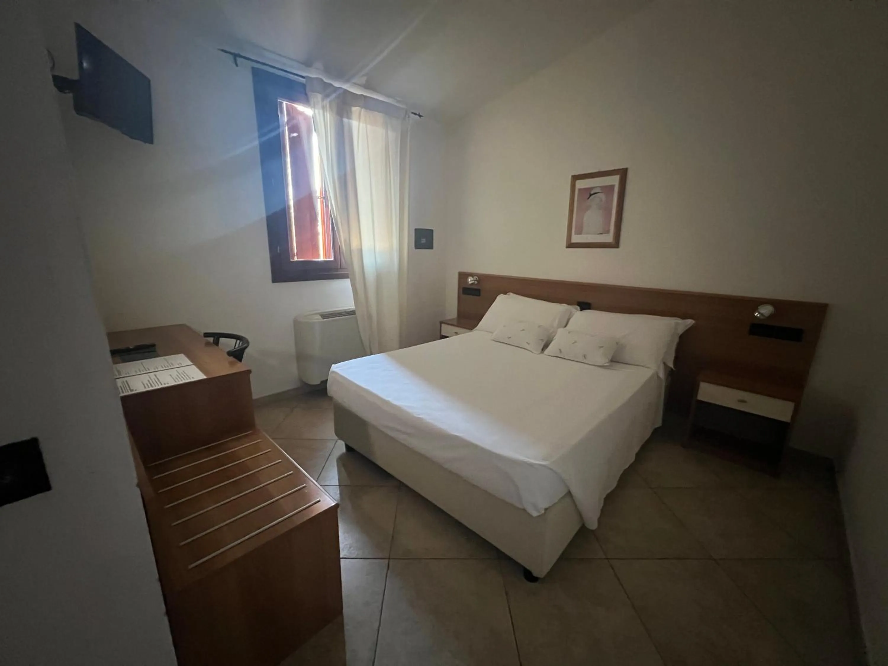 Bed in Hotel Le Corti