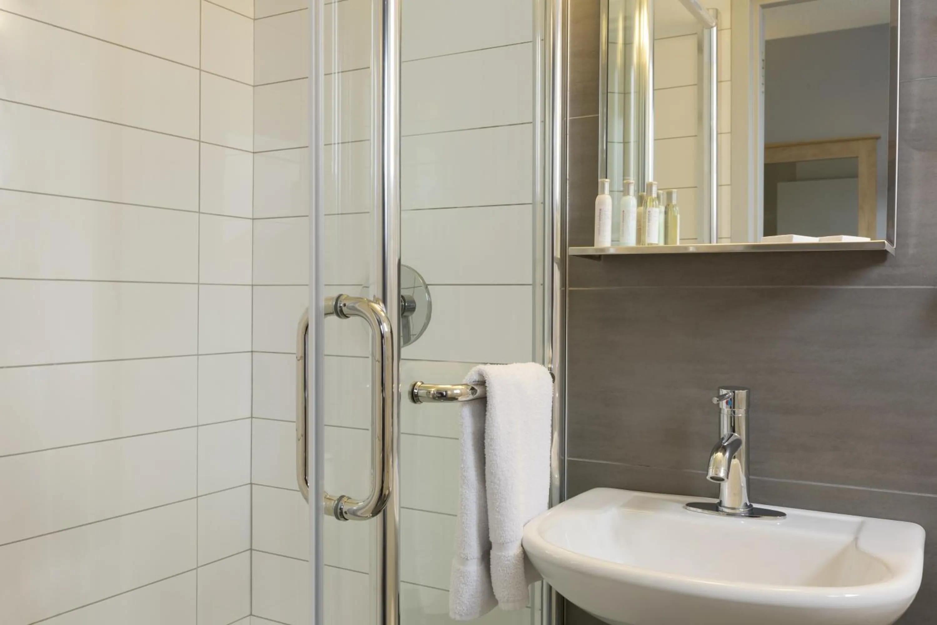 Bathroom in Travelodge by Wyndham Montreal Centre