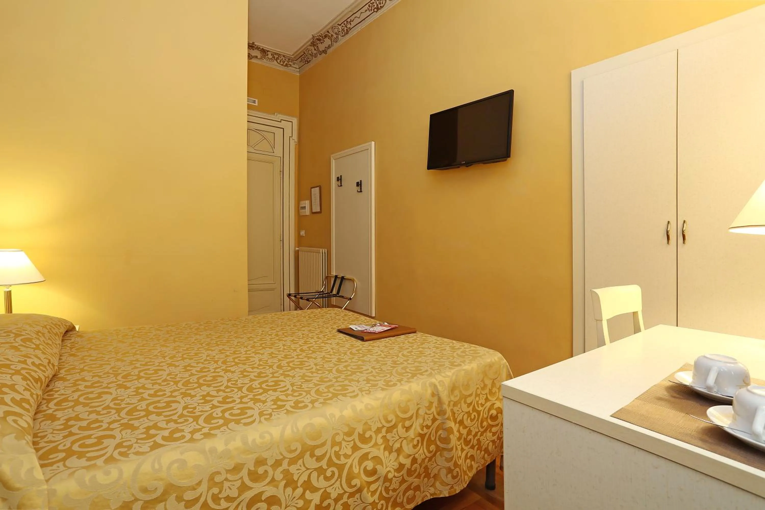 Bed in DG Prestige Room