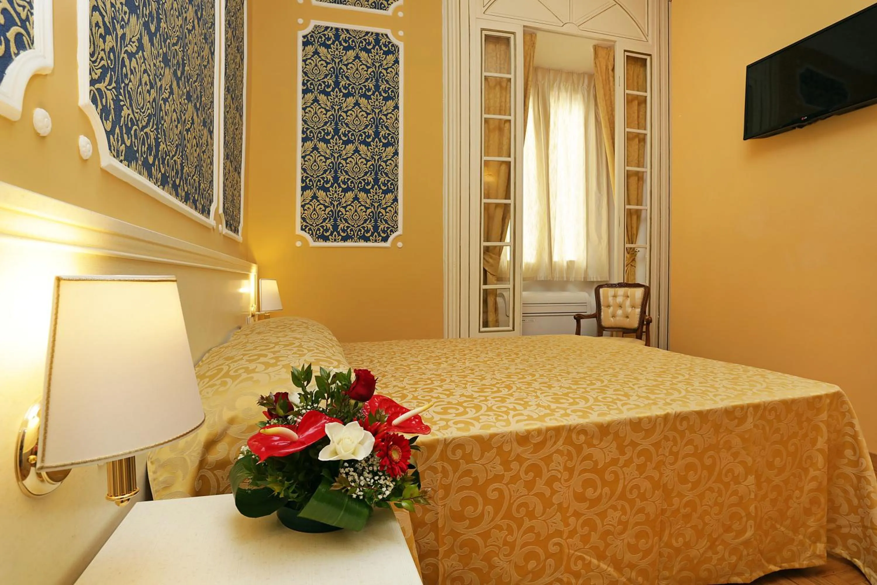 Bed in DG Prestige Room