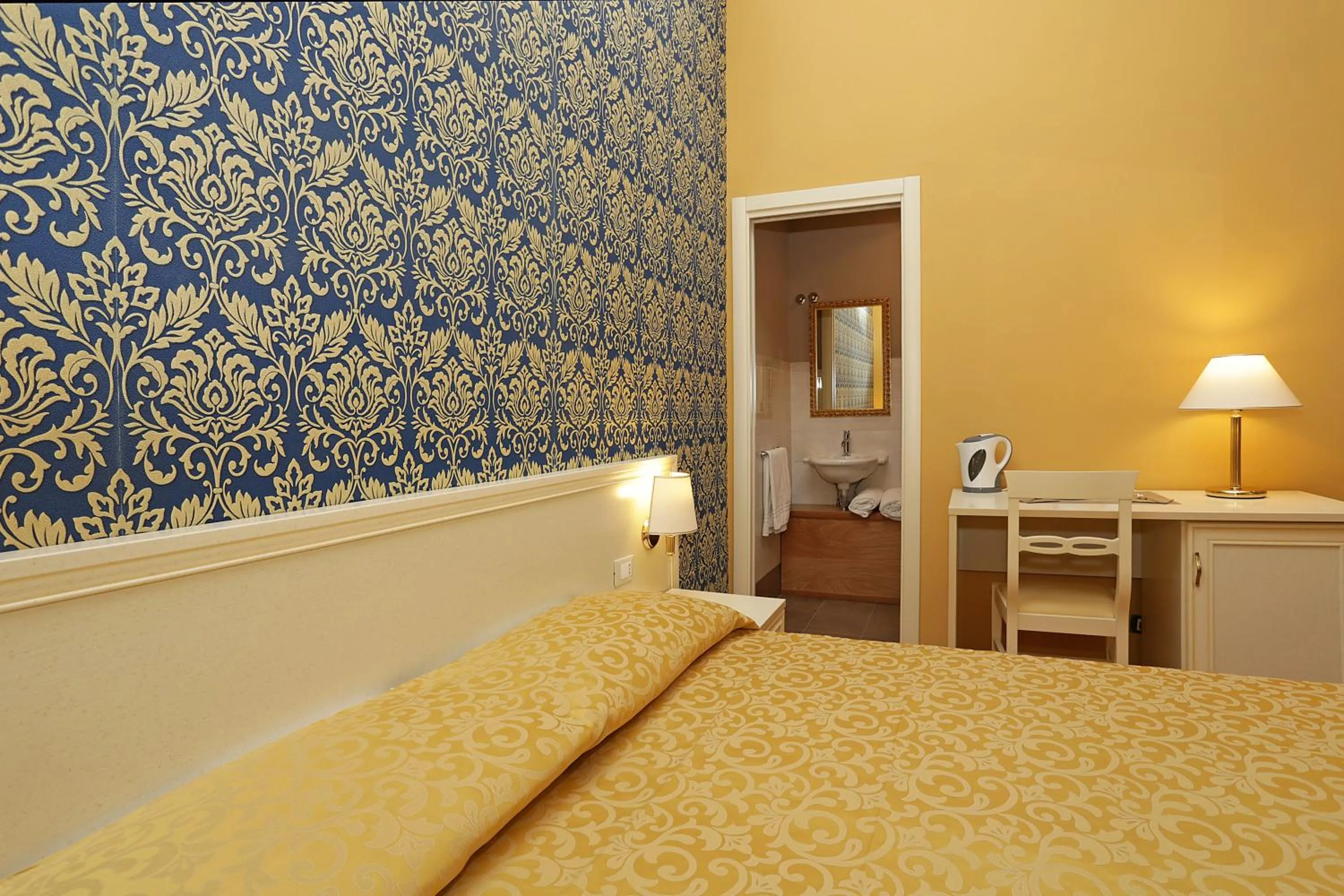 Bed in DG Prestige Room