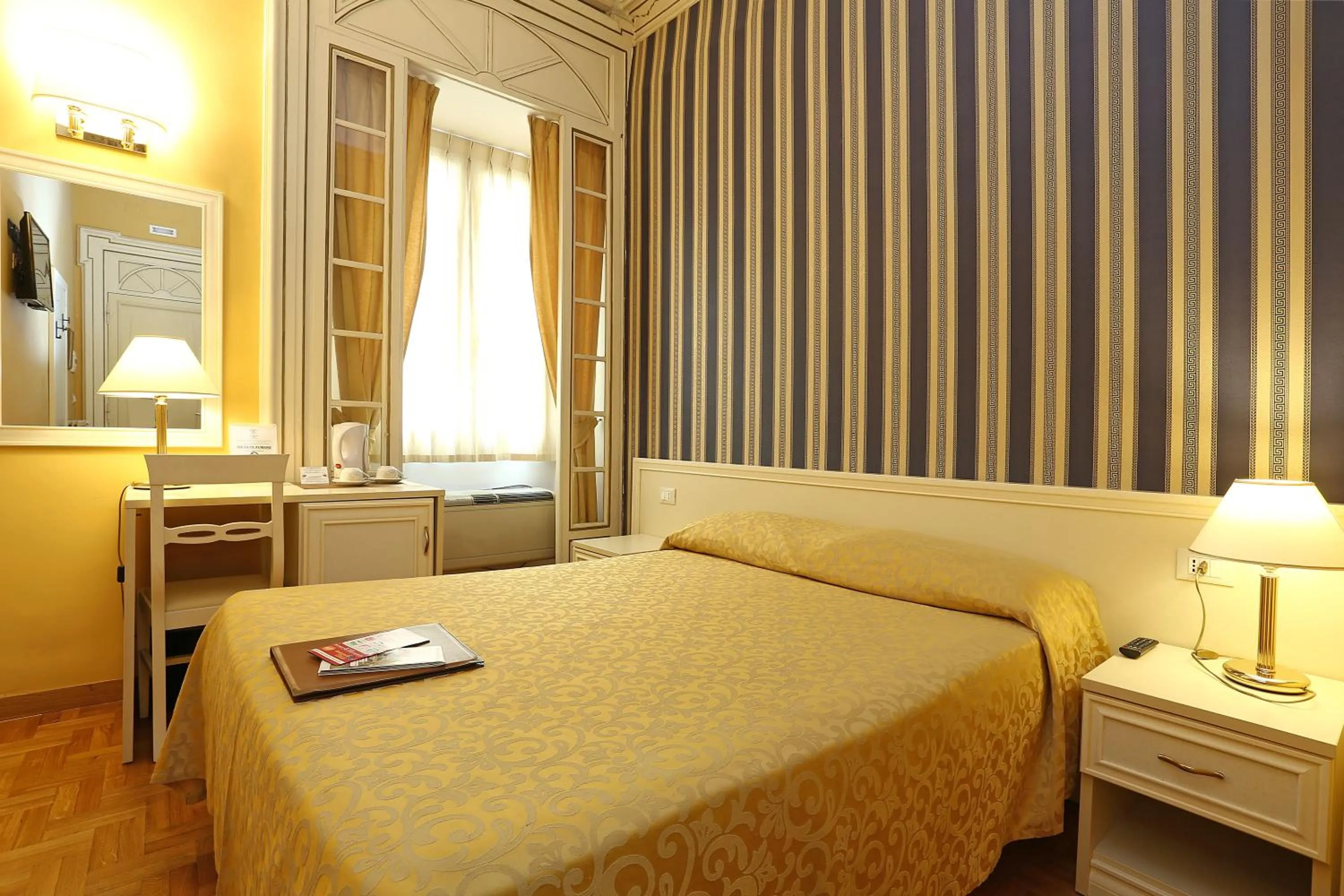 Bed in DG Prestige Room