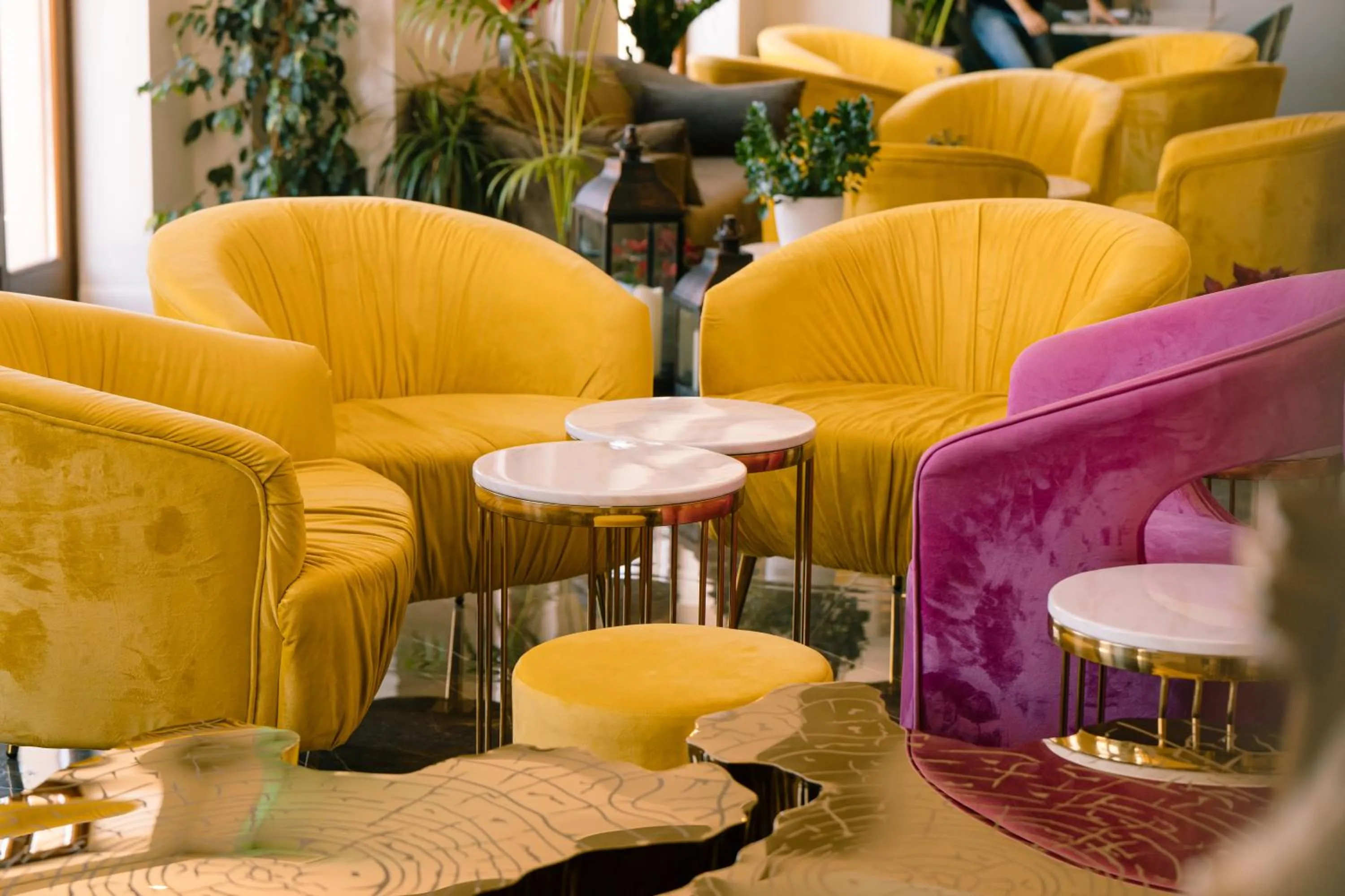 Communal lounge/ TV room in Santa Lucia Boutique Hotel