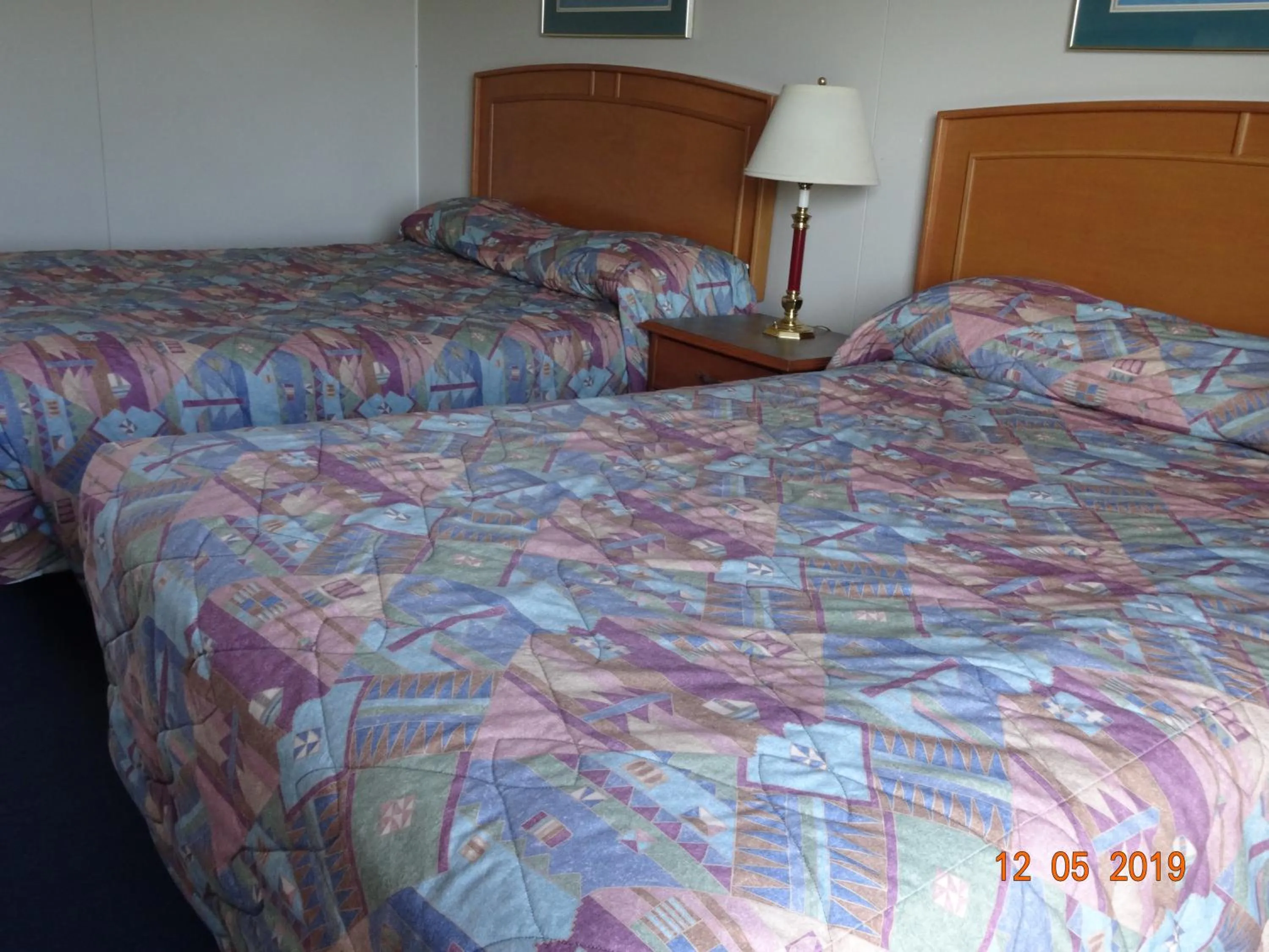 Bed in Hospitality Inn