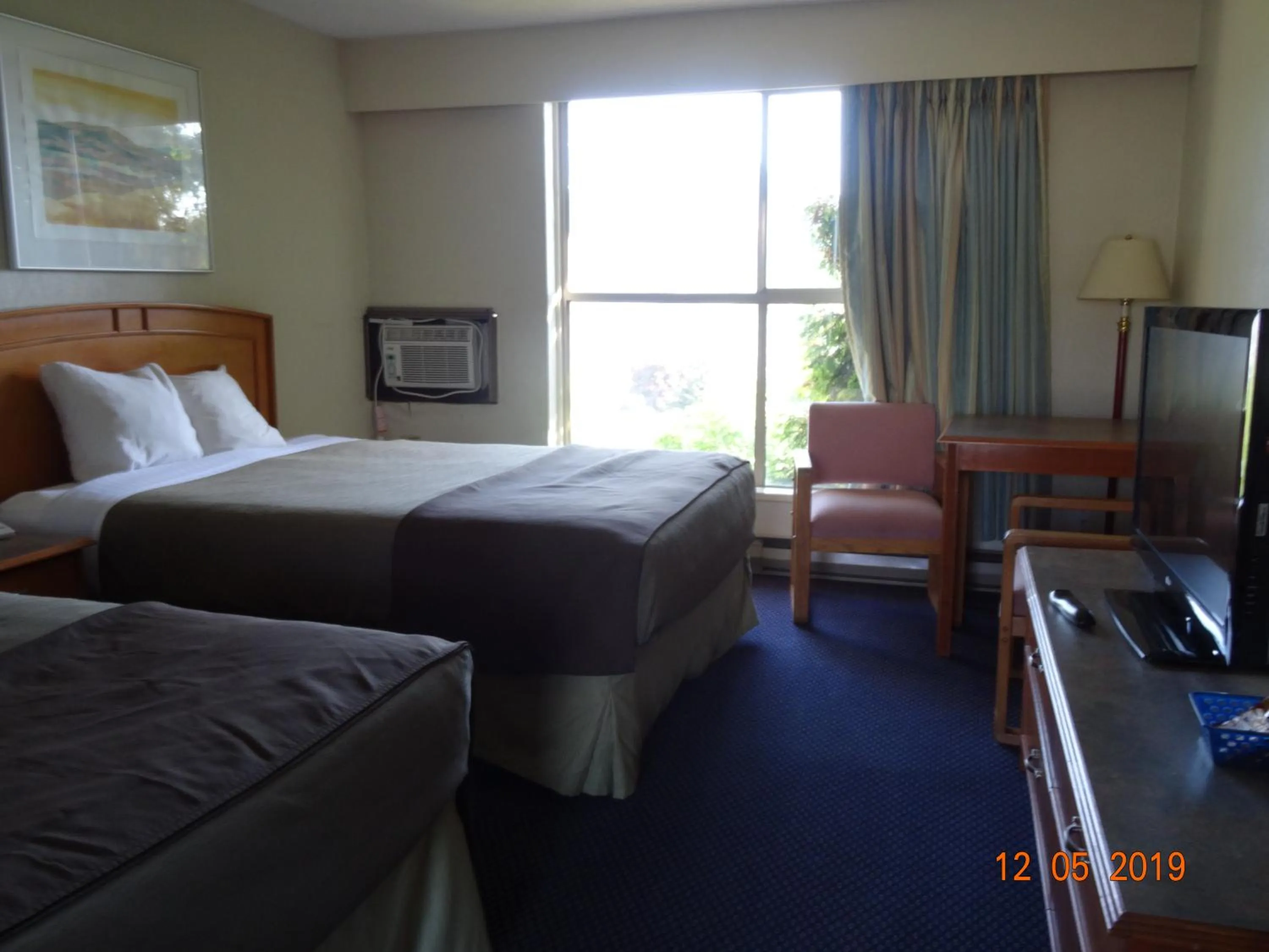 Bed in Hospitality Inn