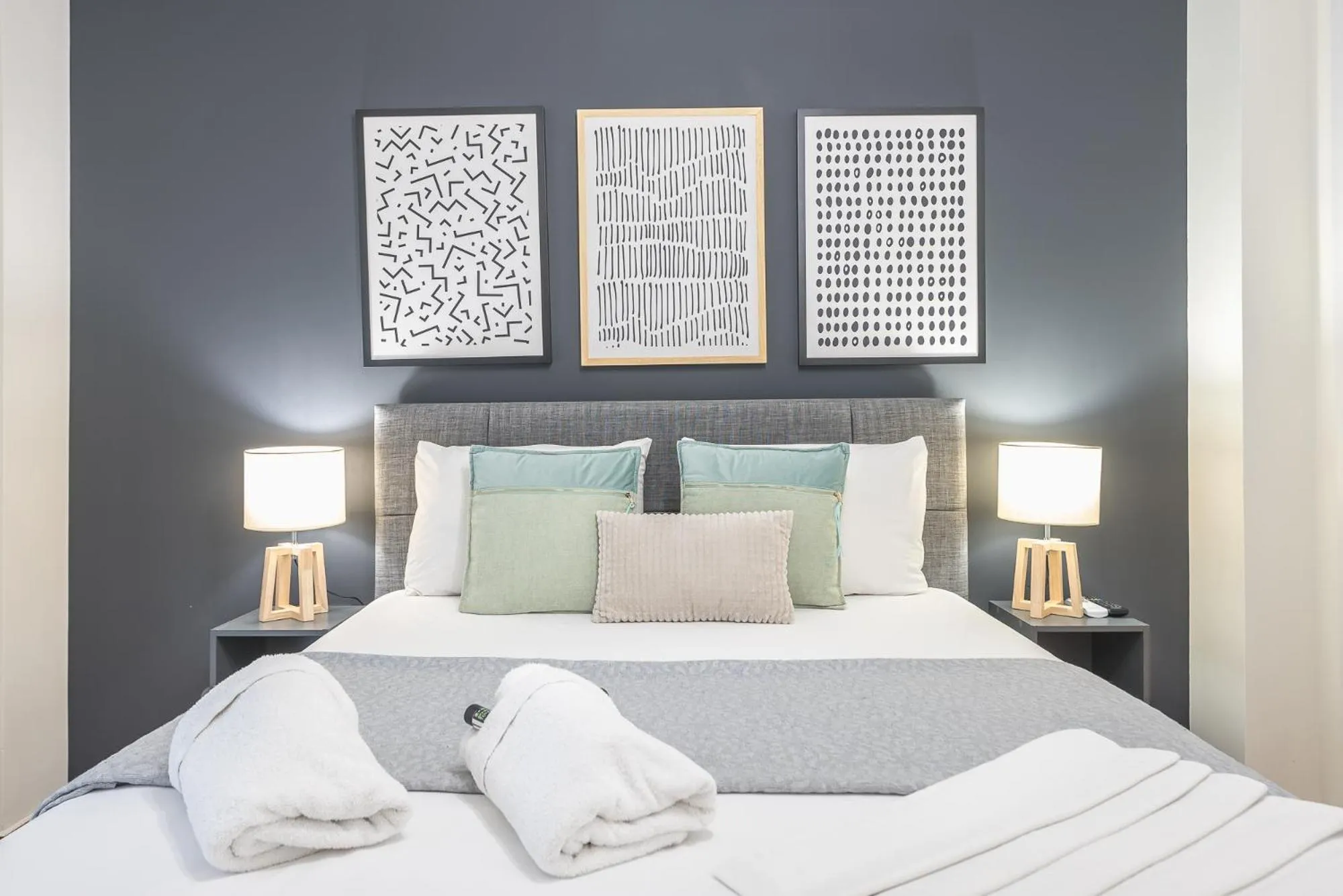 Bed in Elegant Suite by CloudKeys