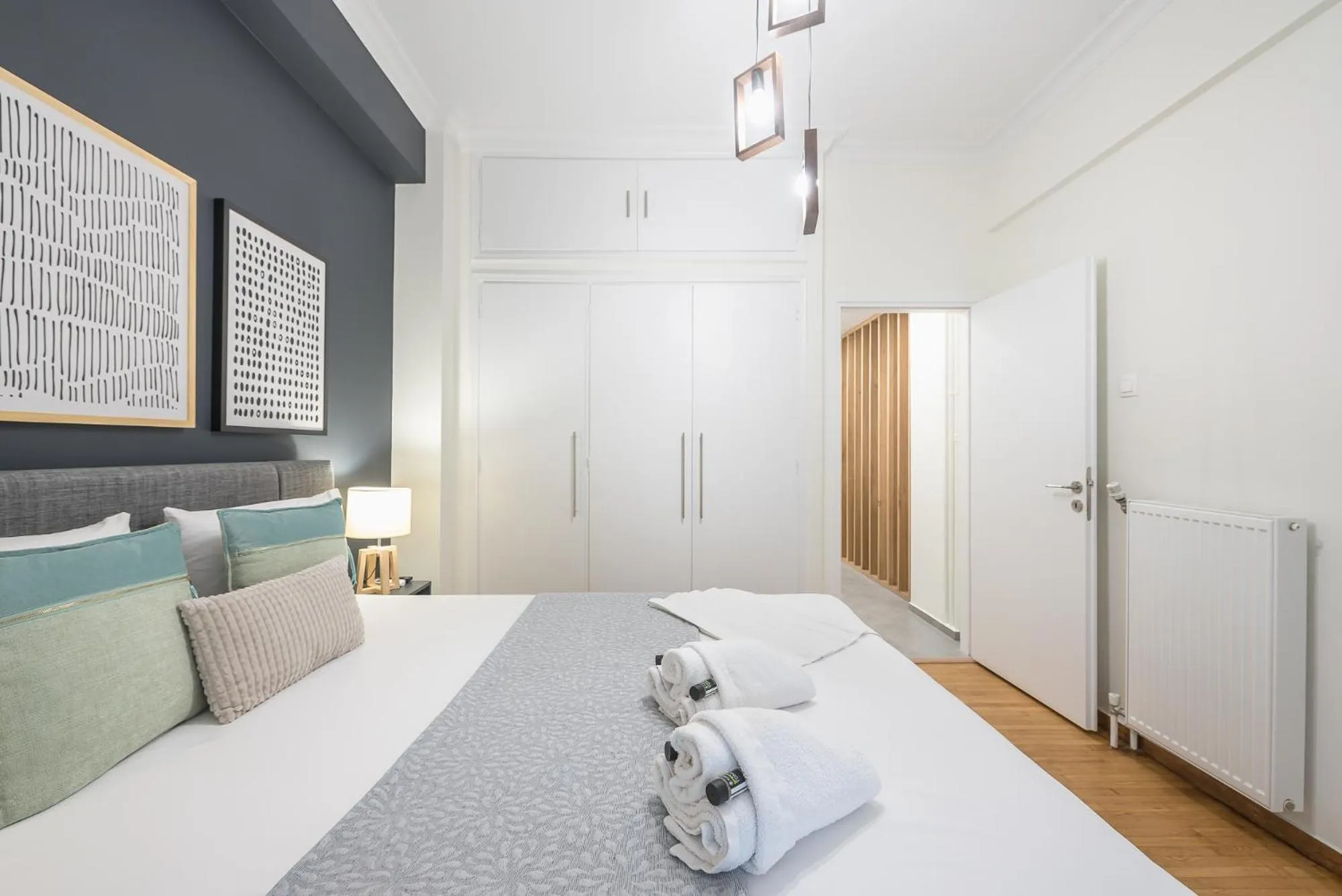 Bed in Elegant Suite by CloudKeys