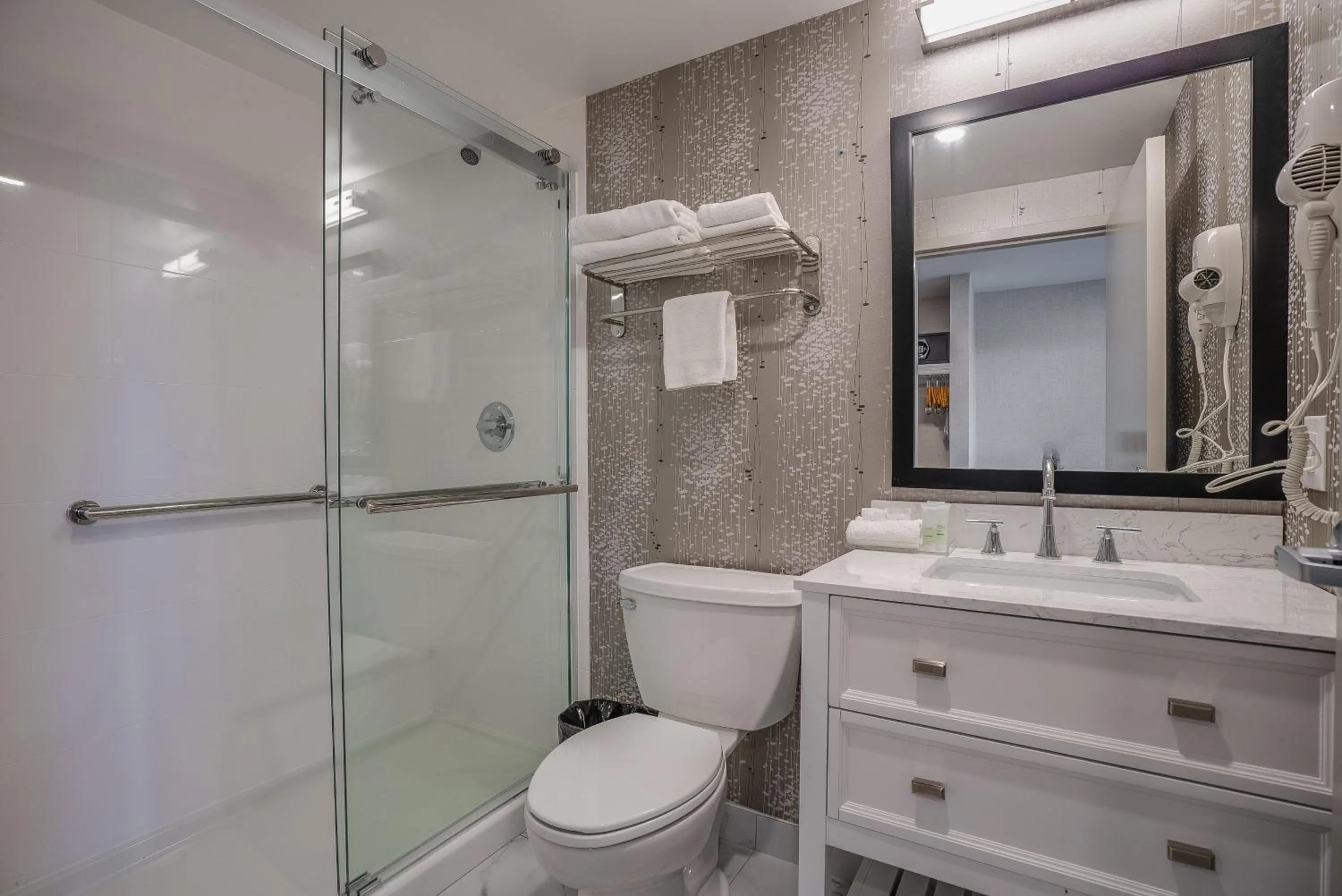 Shower in Monte Carlo Inn Oakville Suites