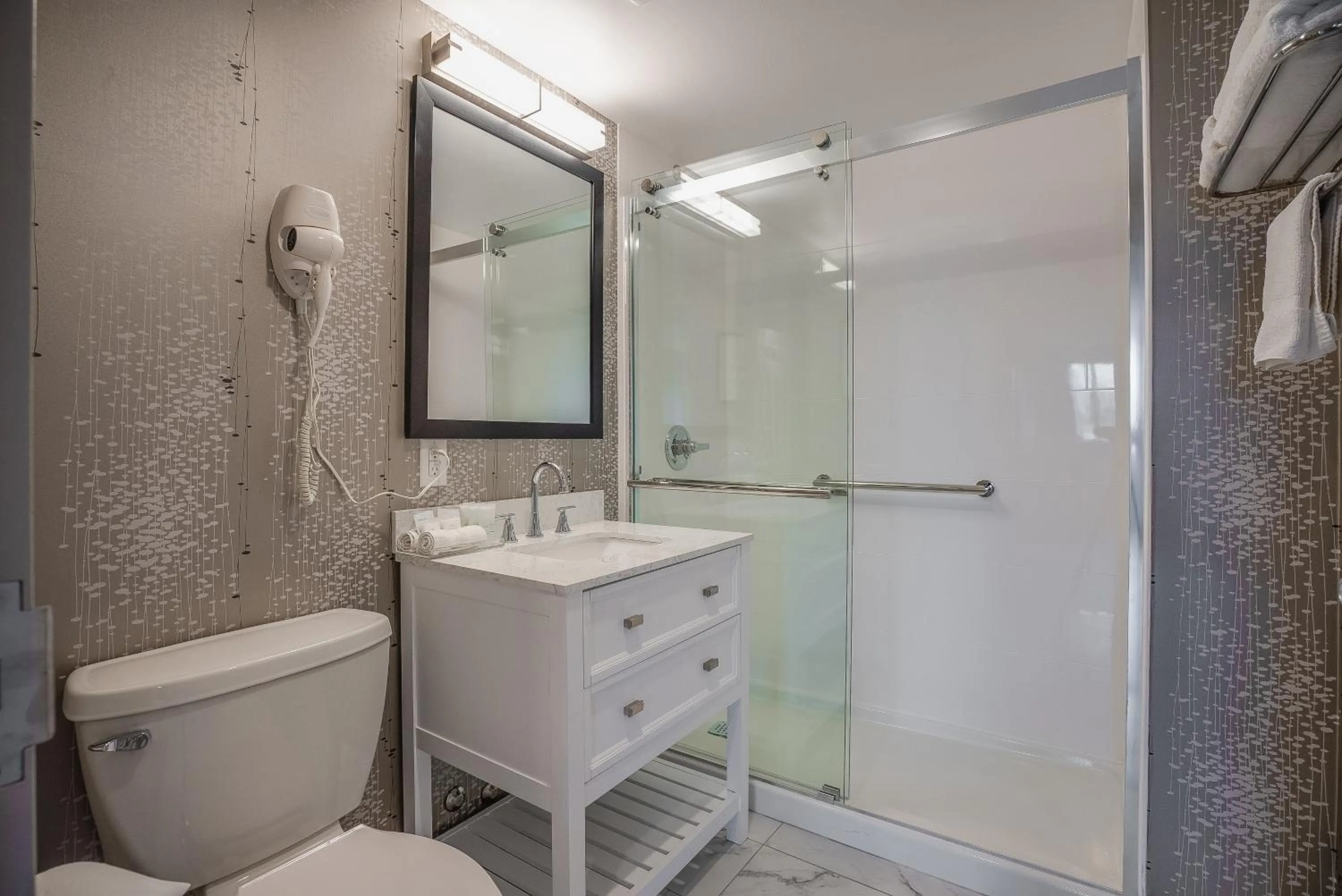 Shower in Monte Carlo Inn Oakville Suites