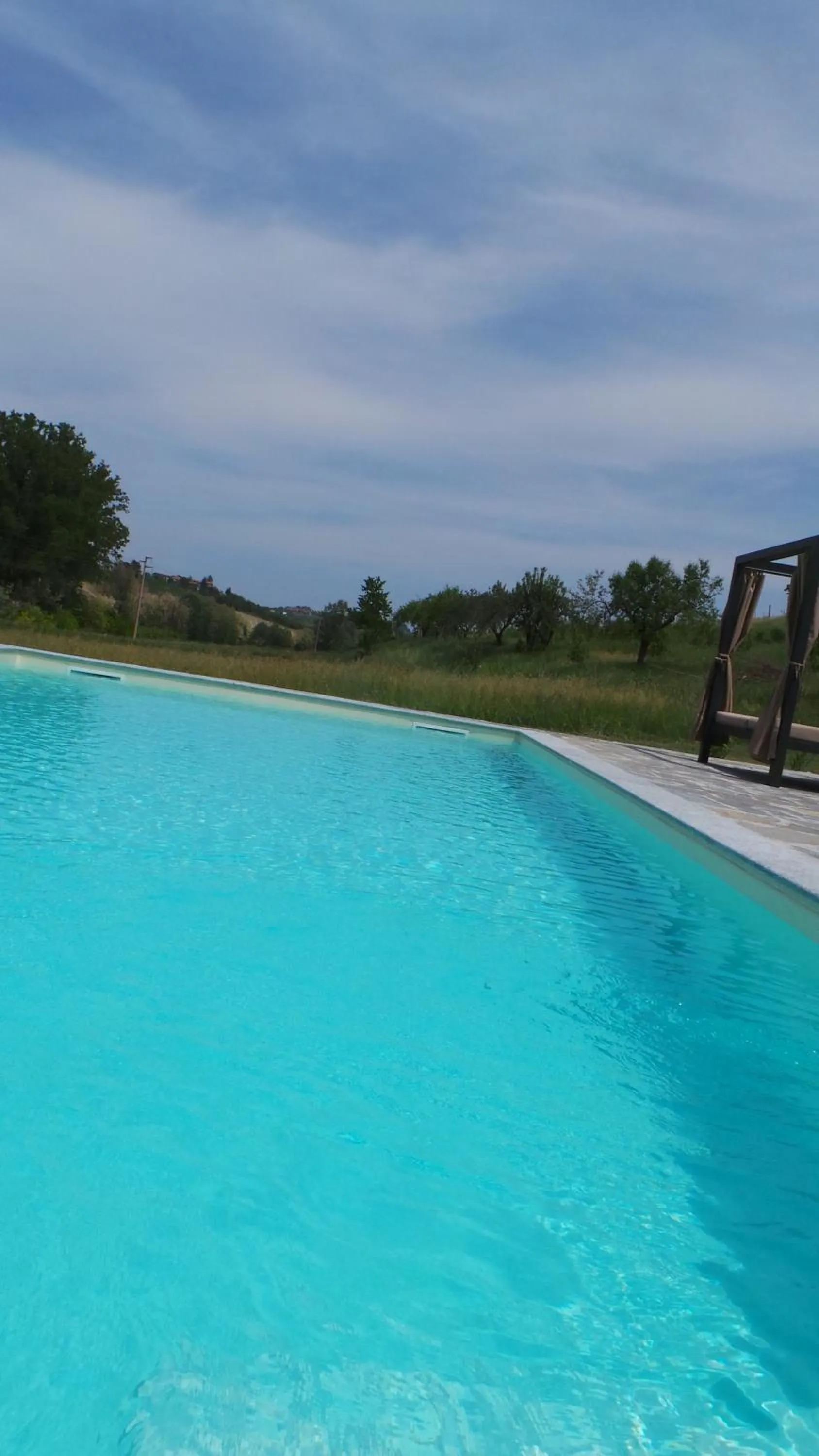 Swimming pool in Sotto La Vigna Charm Stay Adults only vacation Bed and breakfast room