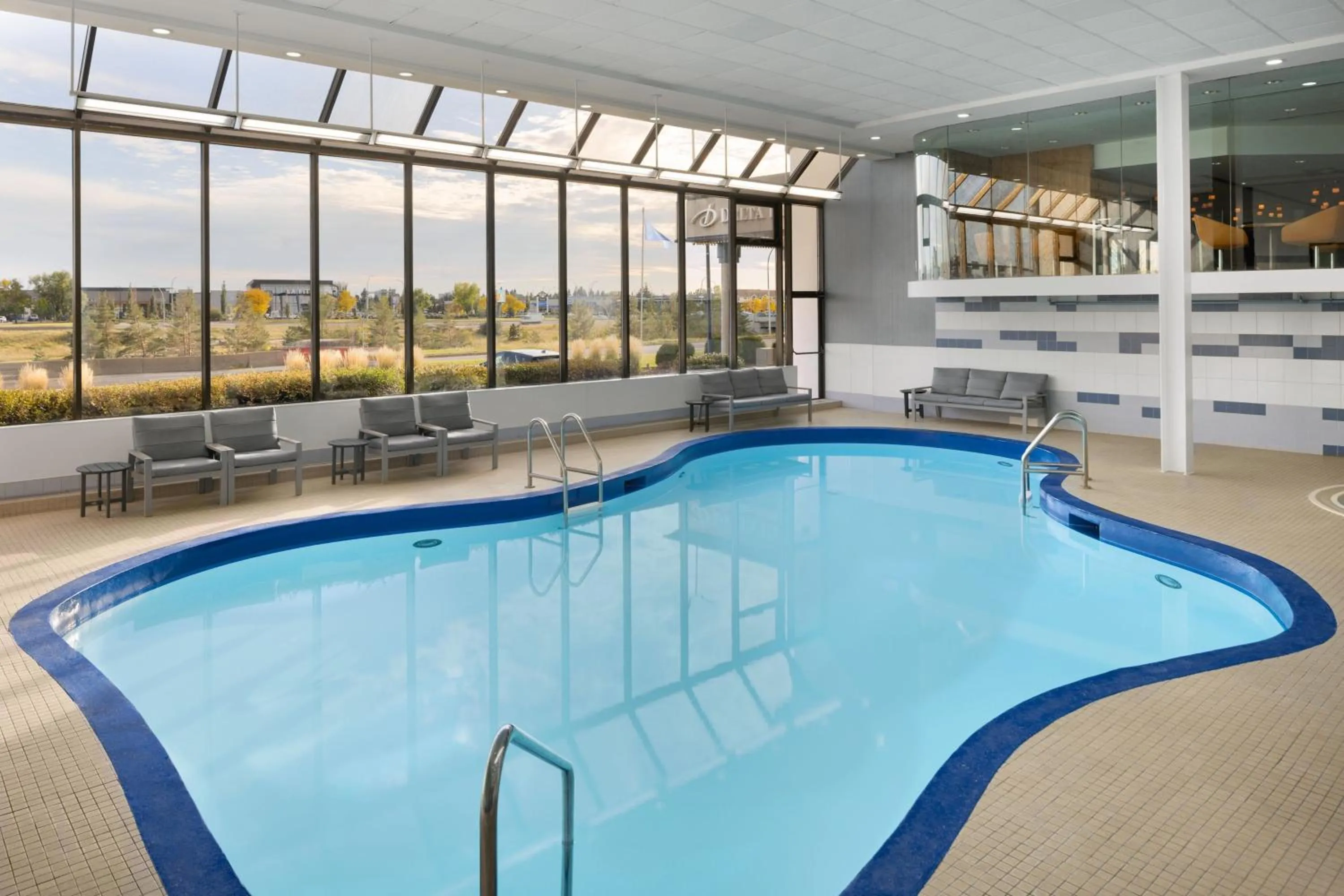 Swimming pool in Delta Hotels by Marriott Edmonton South Conference Centre