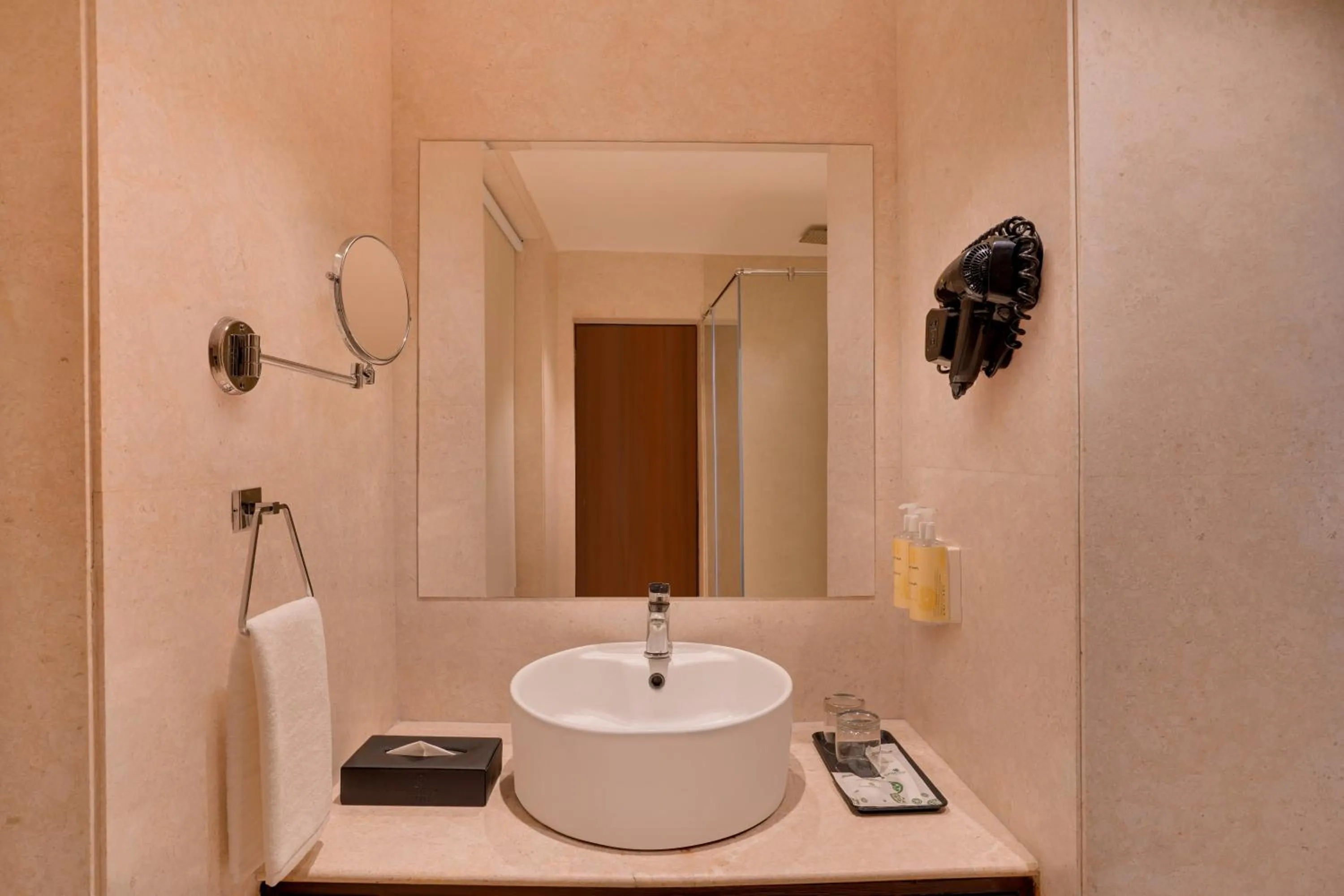 Bathroom in Lemon Tree Hotel, Noida
