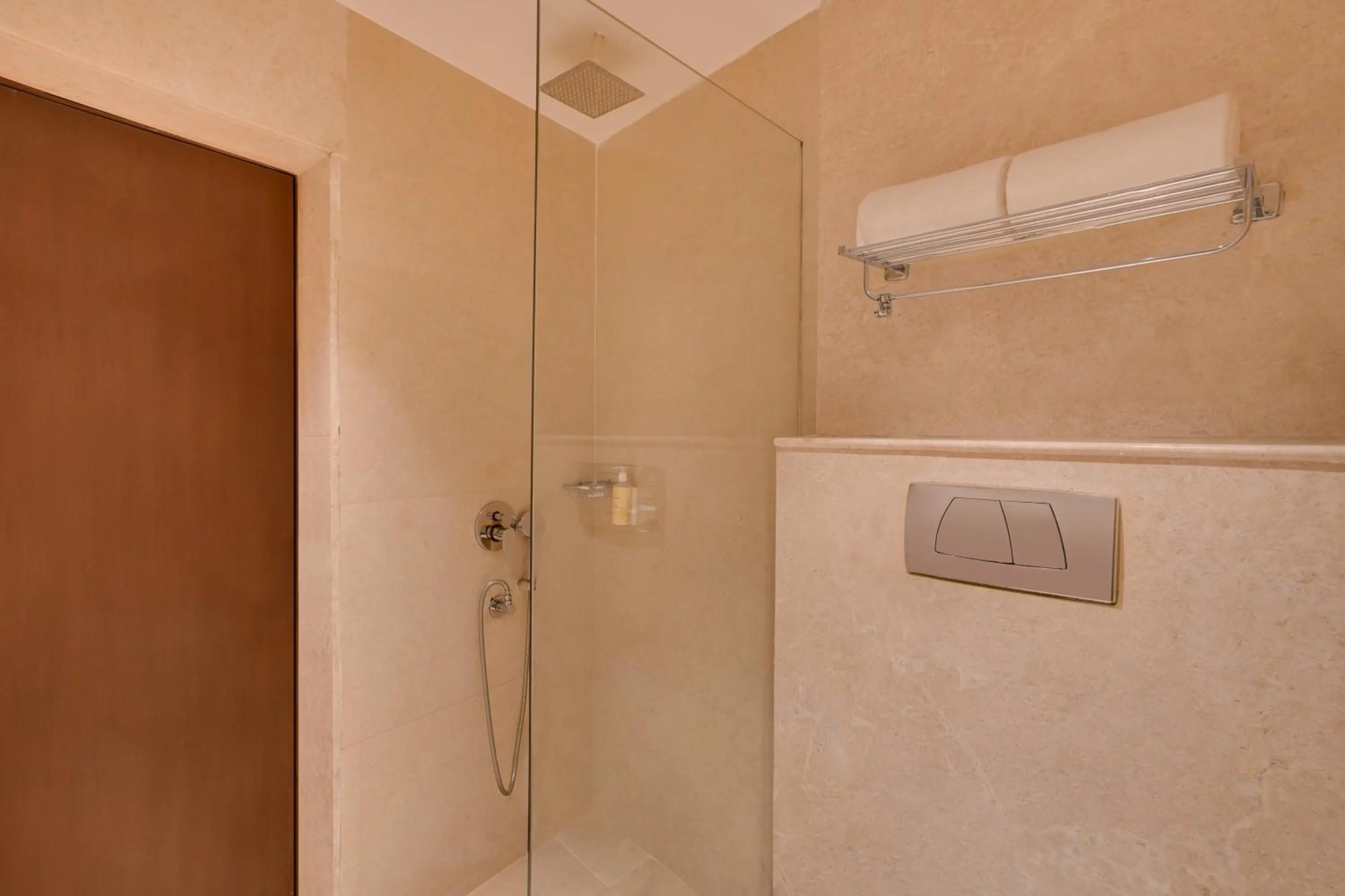 Bathroom in Lemon Tree Hotel, Noida