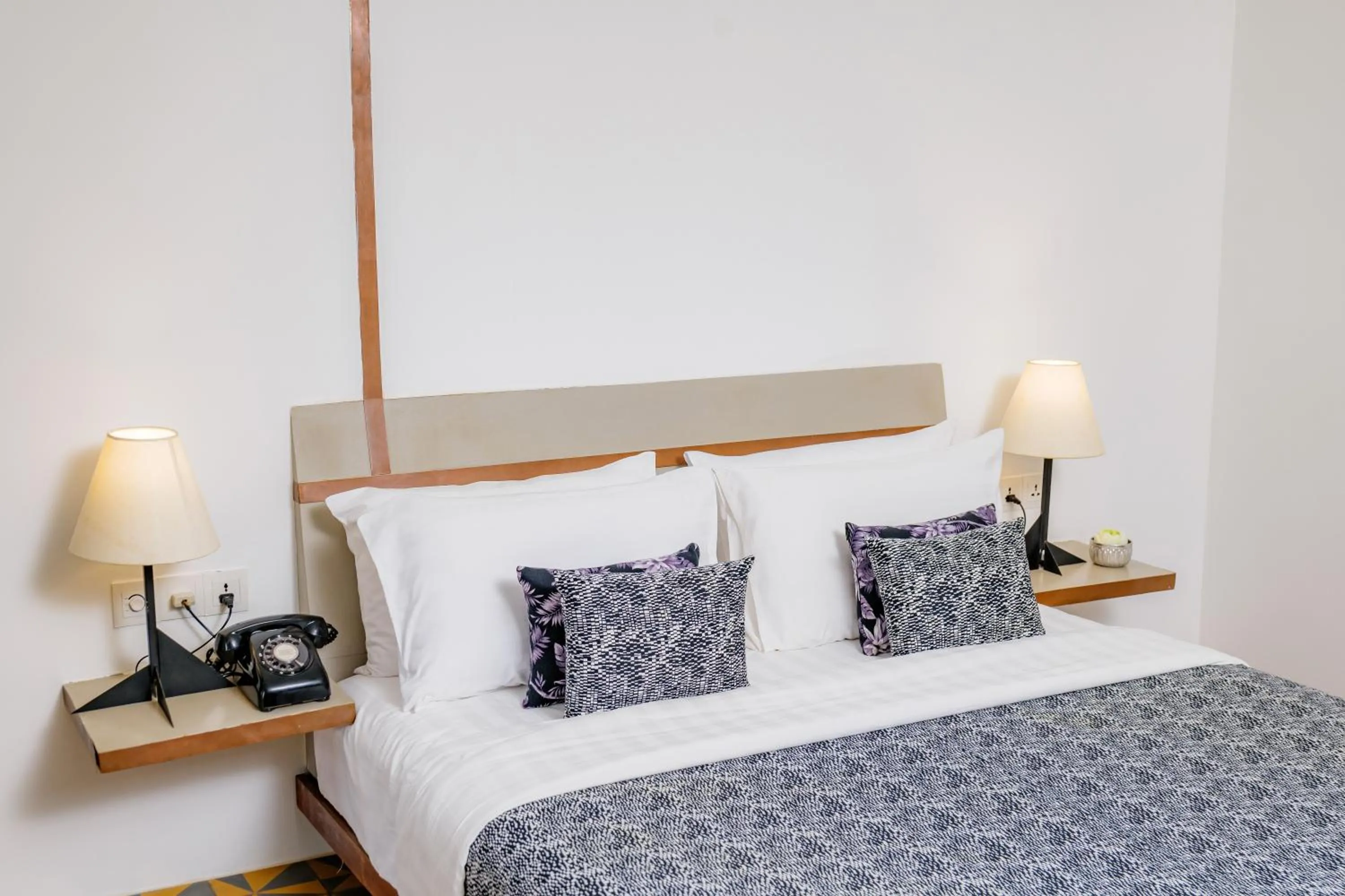 Bed in Atelier Hotel