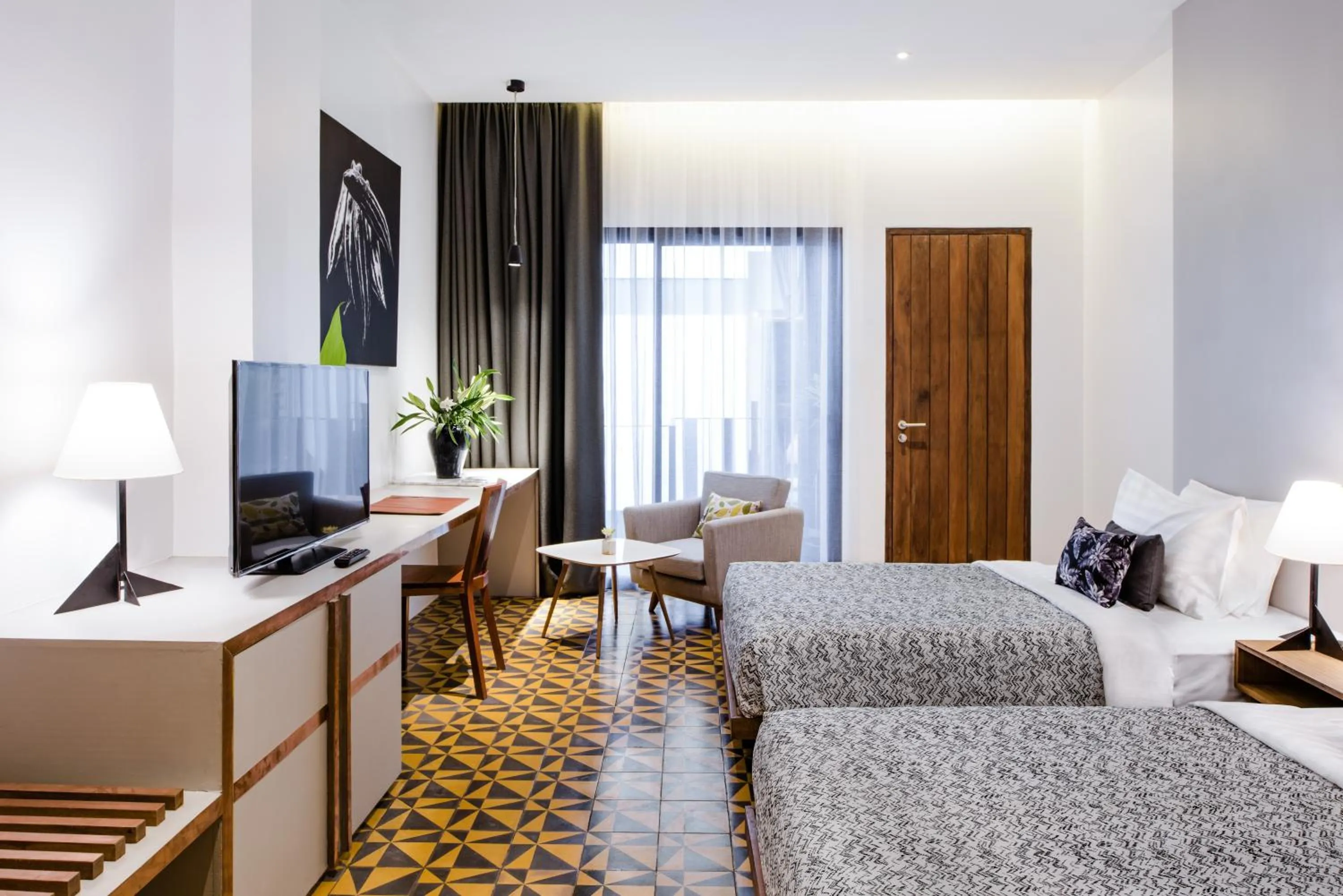 Bed in Atelier Hotel