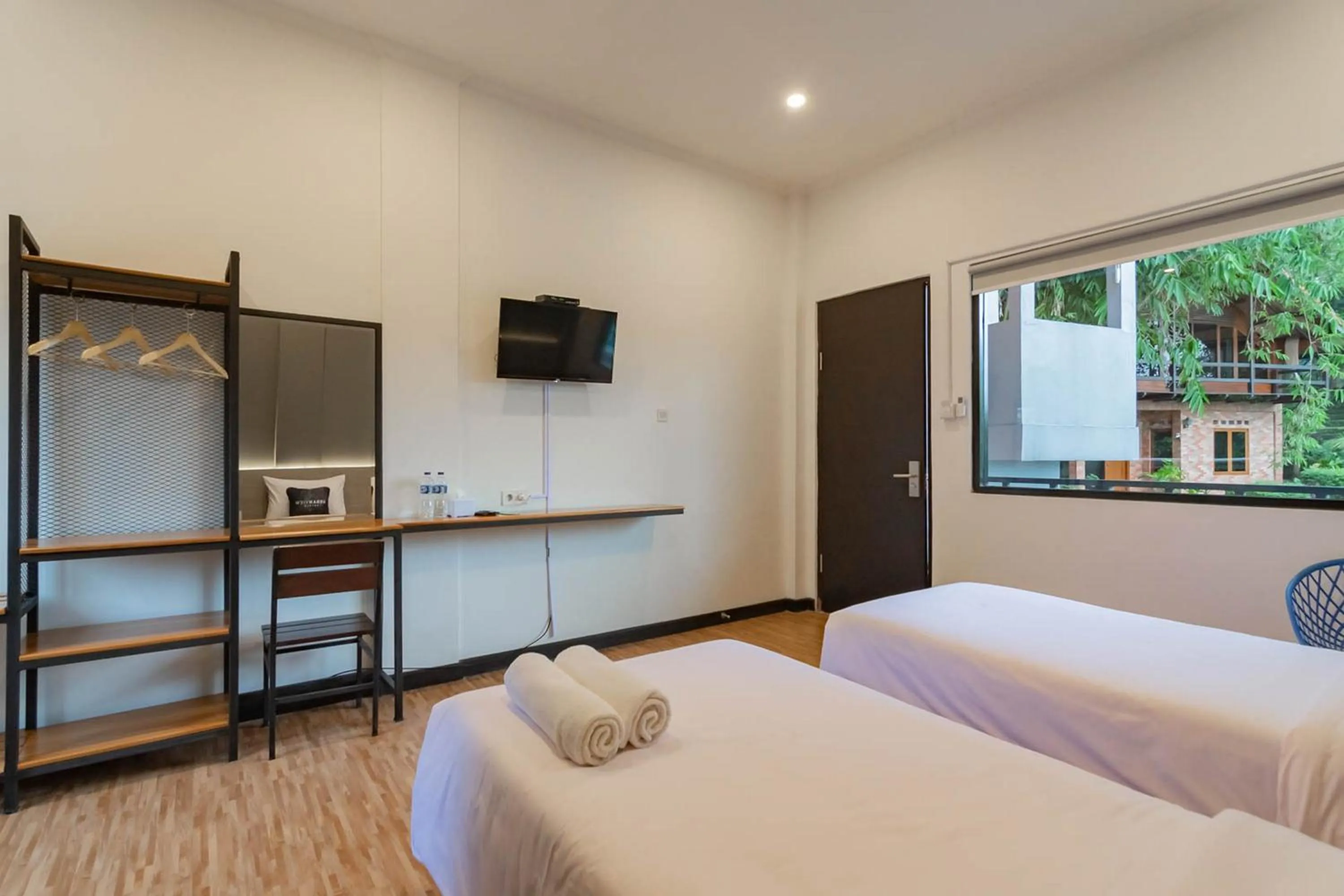 Bedroom, Bed in Urbanview Hotel Sagara Bogor