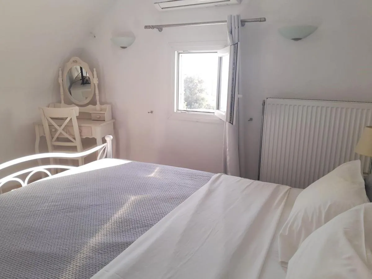 Bed in Sea paradise villas - Seaside & private jacuzzi