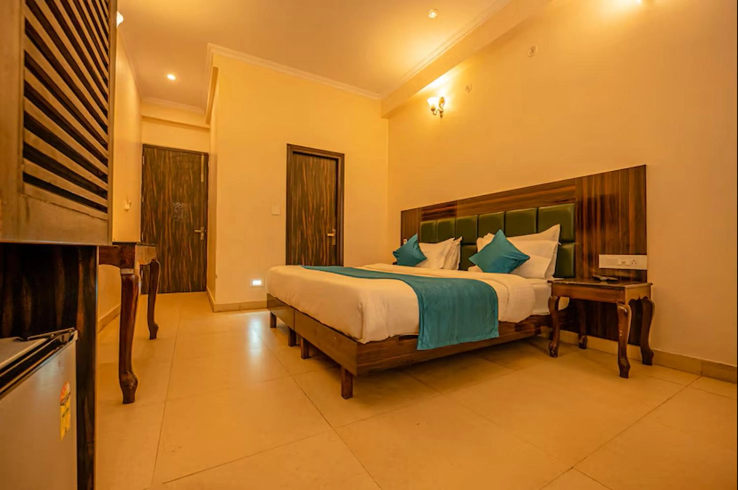 Bedroom, Bed in Hotel Rishikesh Grand by Kool Stays