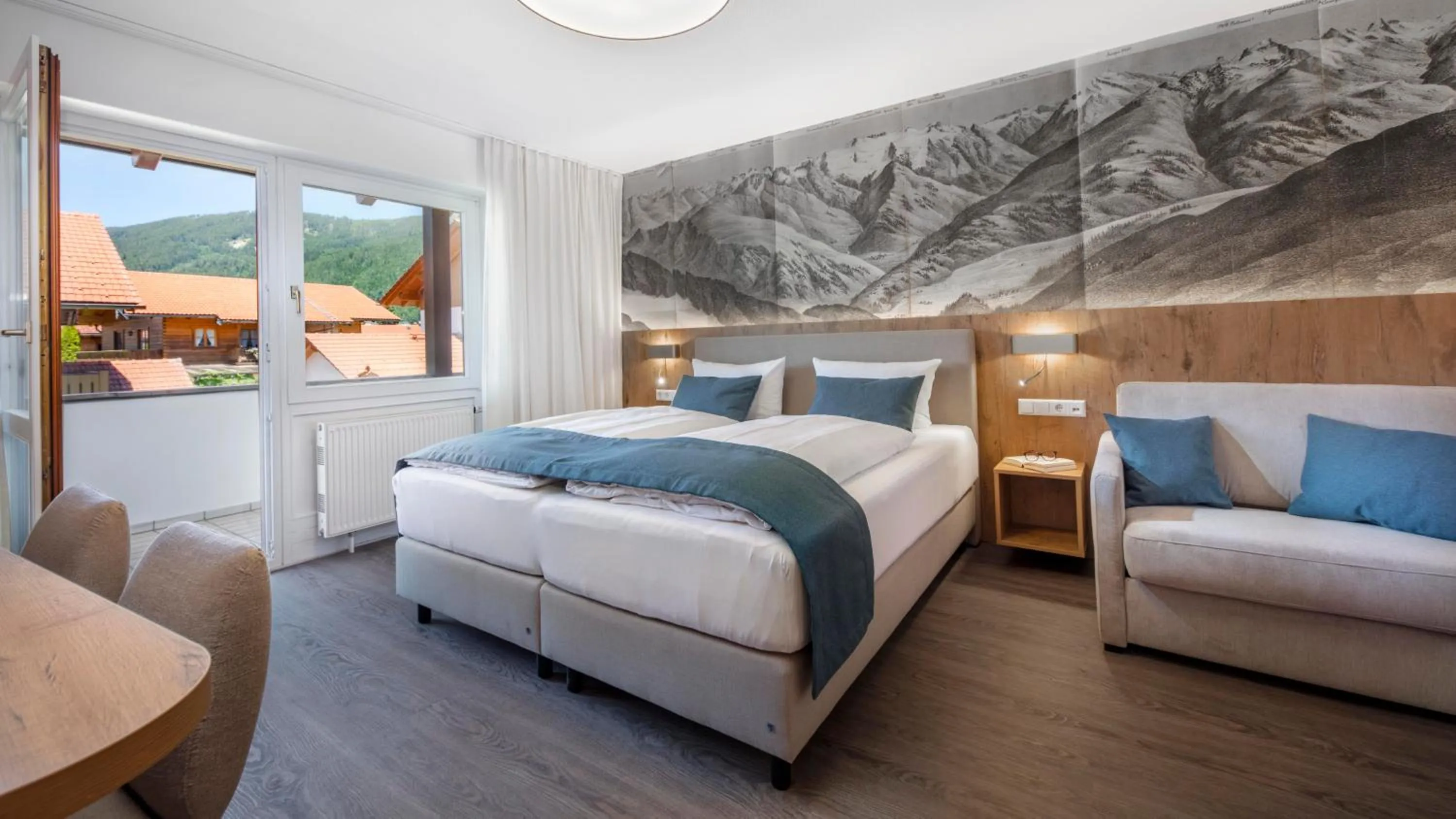 Bed in Aparthotel Chiemgaufuchs - CHIEMGAUKARTE