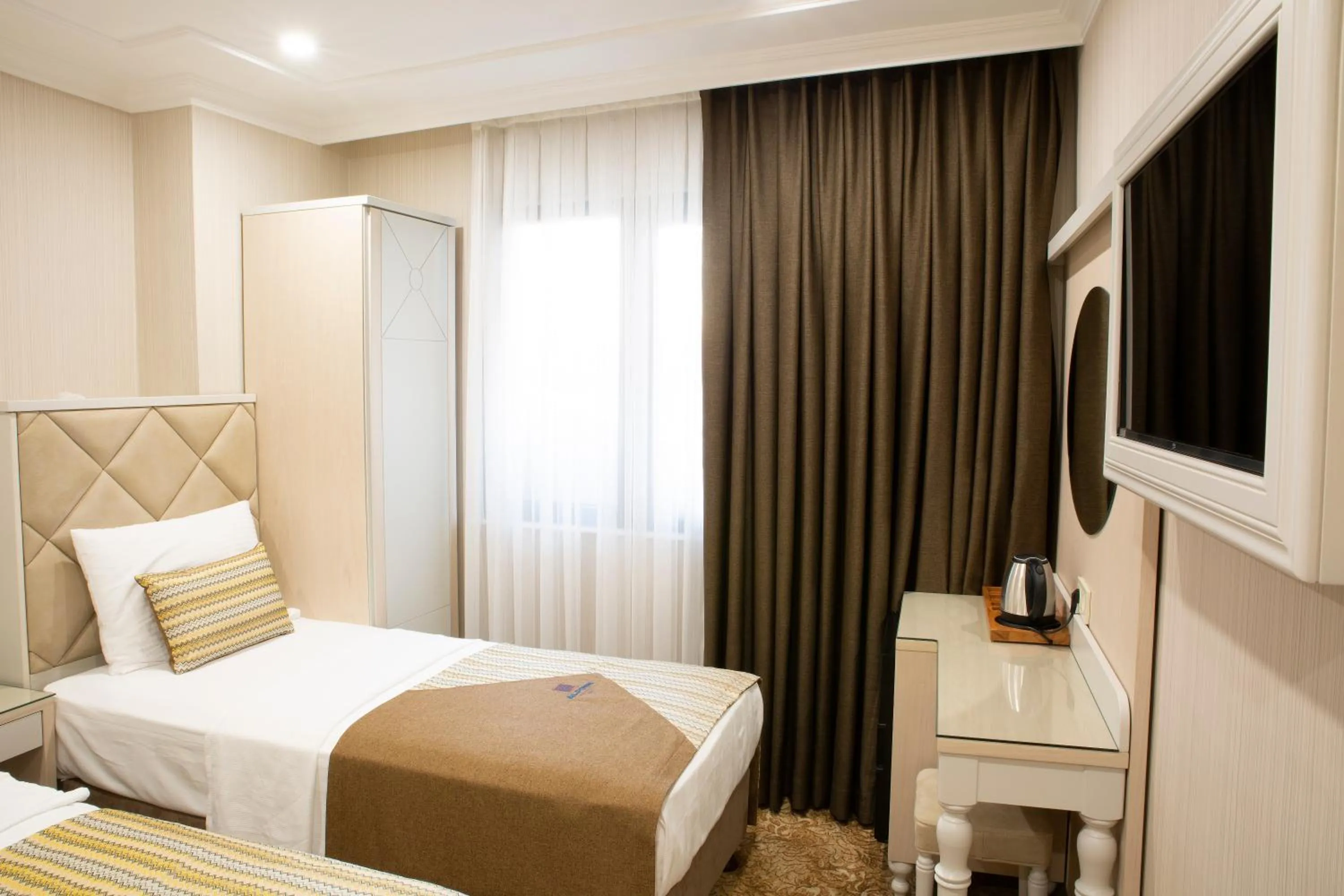 Bed in Alpinn Hotel DUE