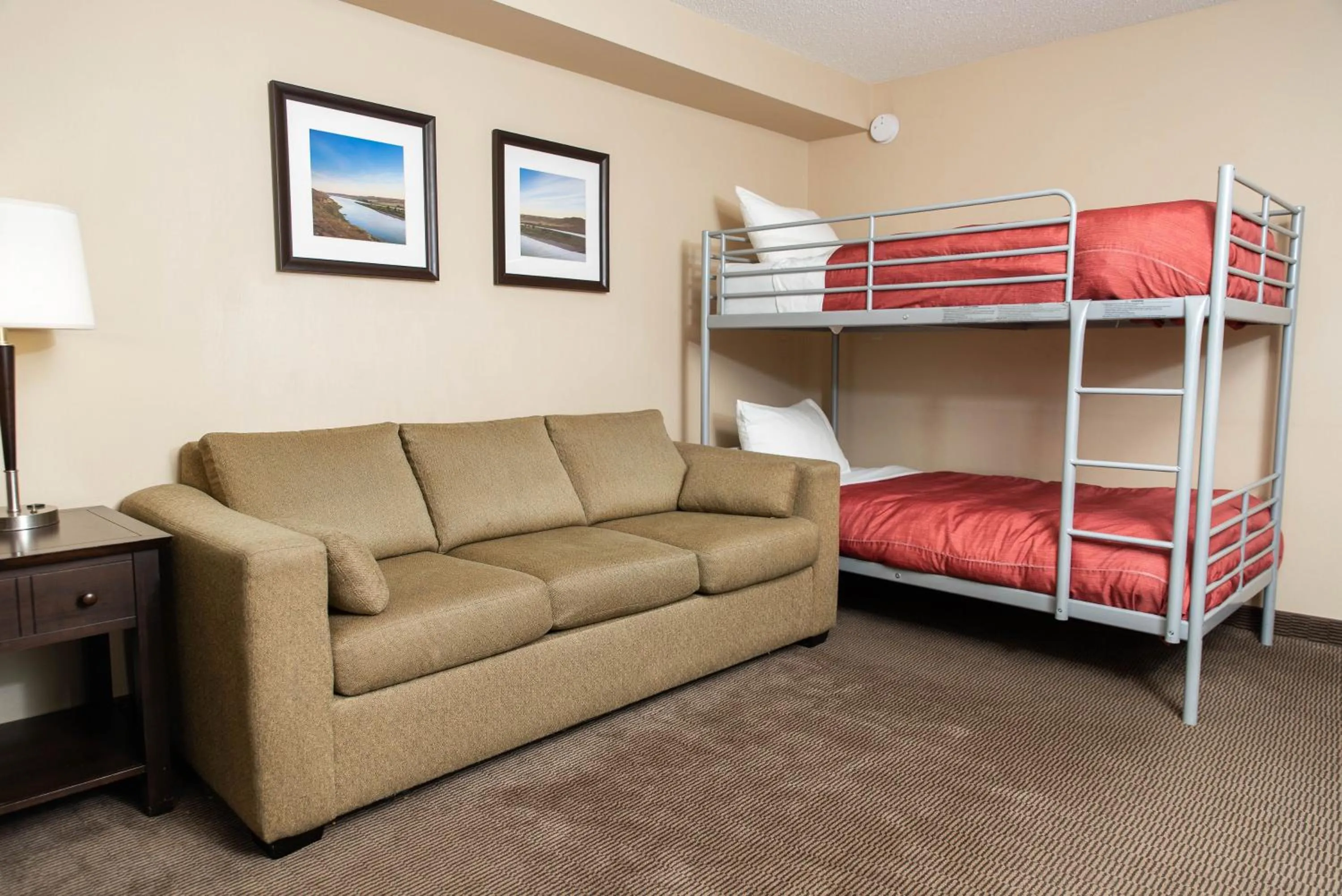 Living room, Bed in Baymont by Wyndham Red Deer