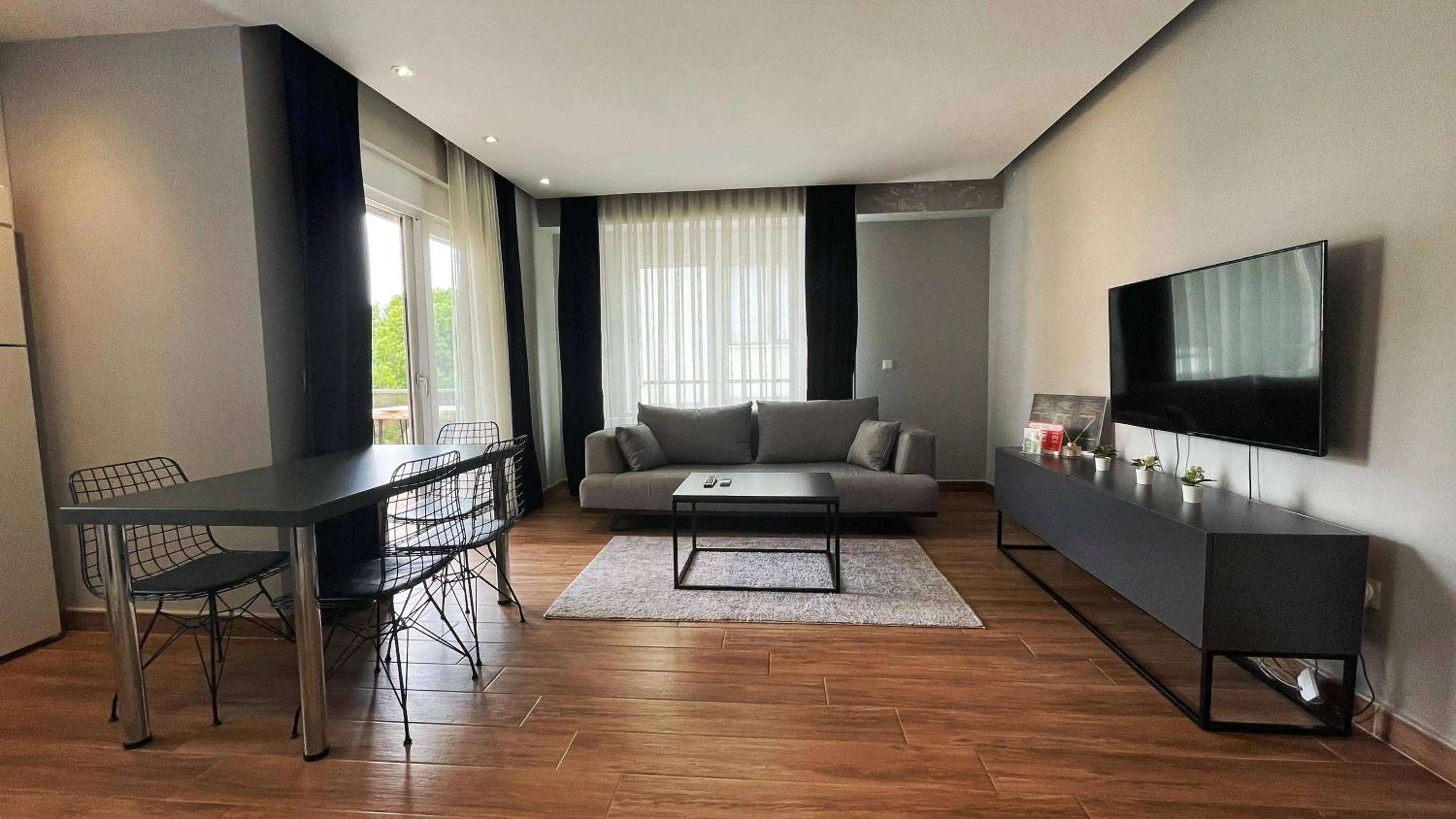 Communal lounge/ TV room in Sun Suites