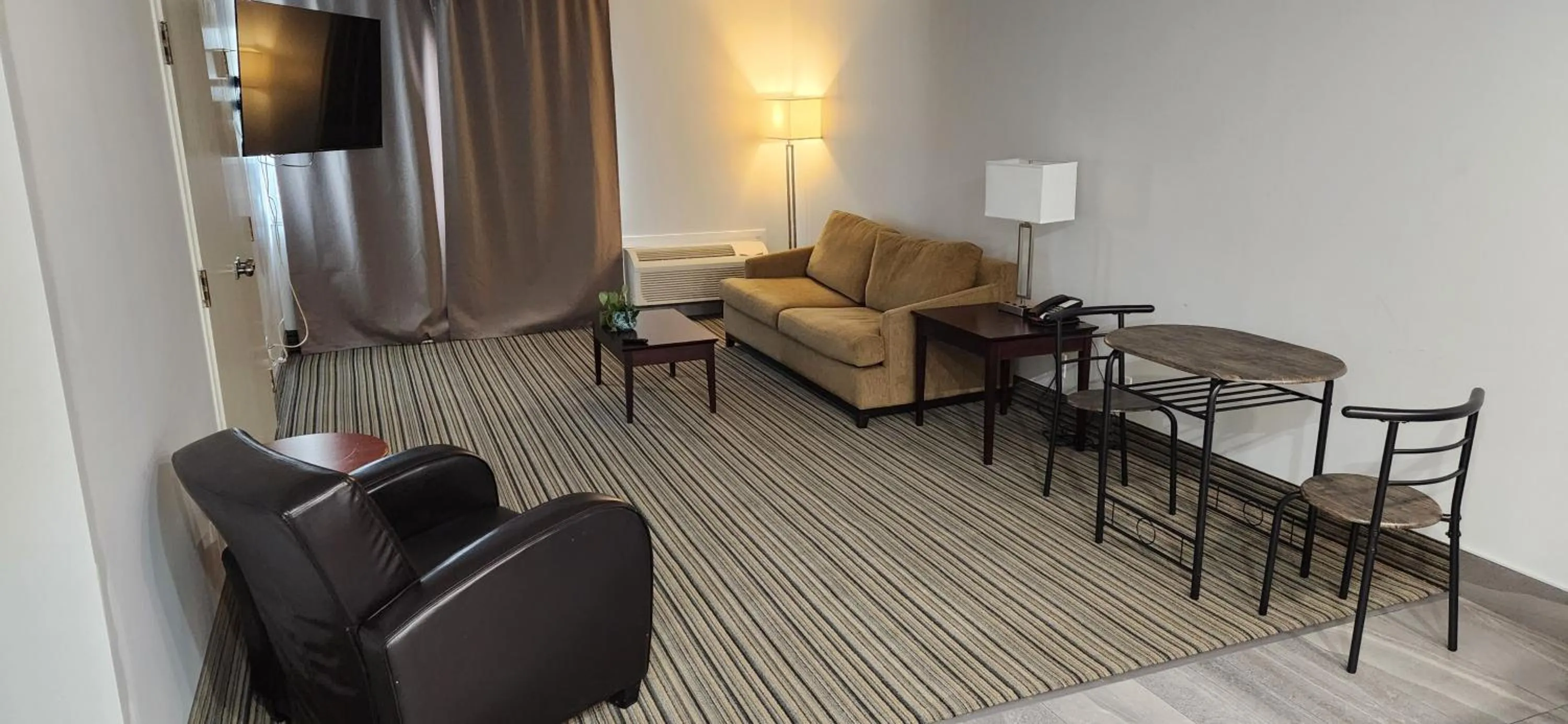 Living room in Ramada by Wyndham London