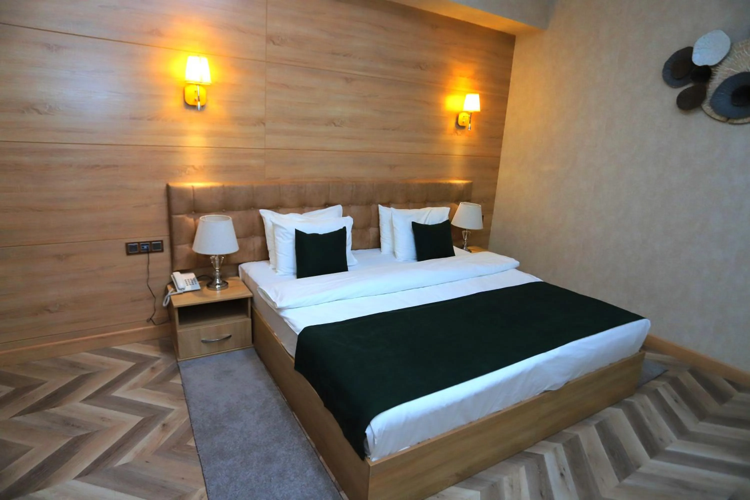 Bed in Central Palace Halal Hotel